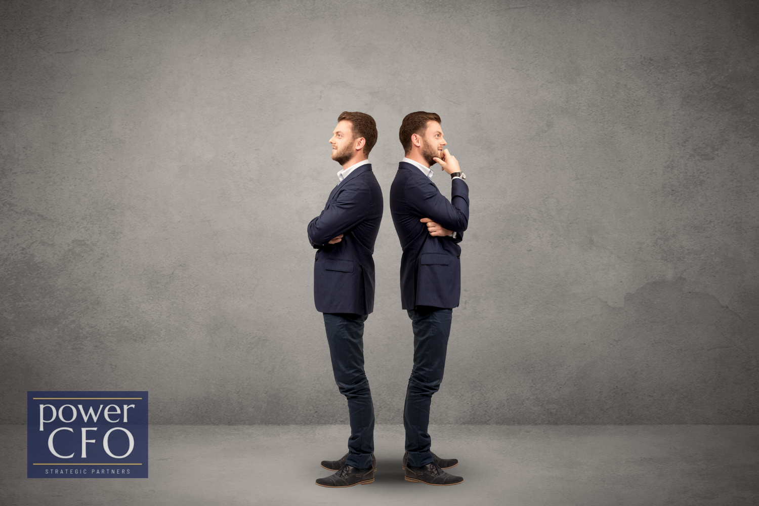 Two business professionals standing back to back, representing the choice between a CFO and controller.