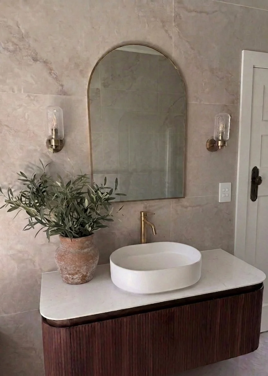 Bathroom, vanity, walnut, beige tiles, brushed brass, wall lights
