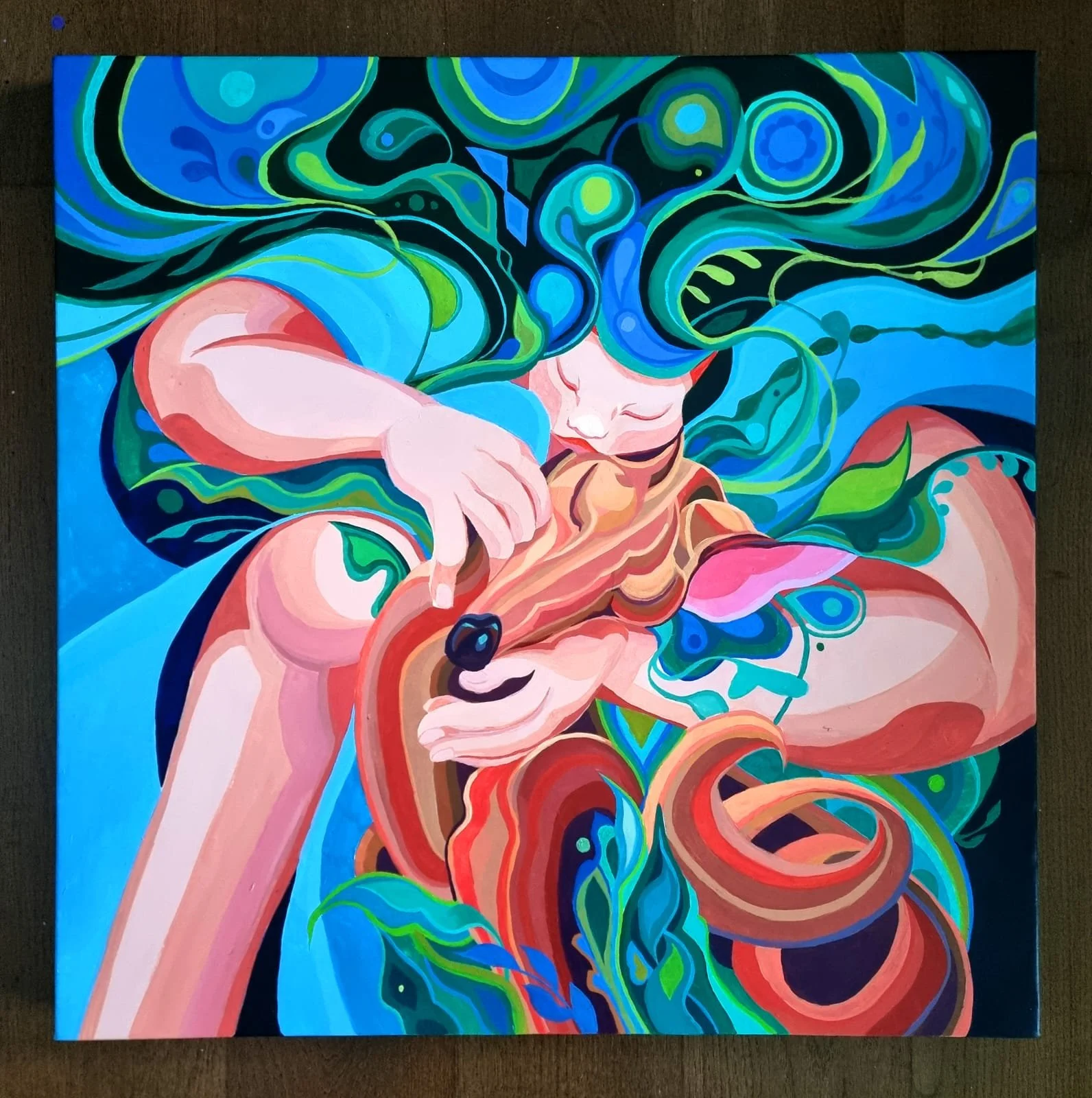 Abstract painting of a girl with colorful flowing hair, holding a deer.