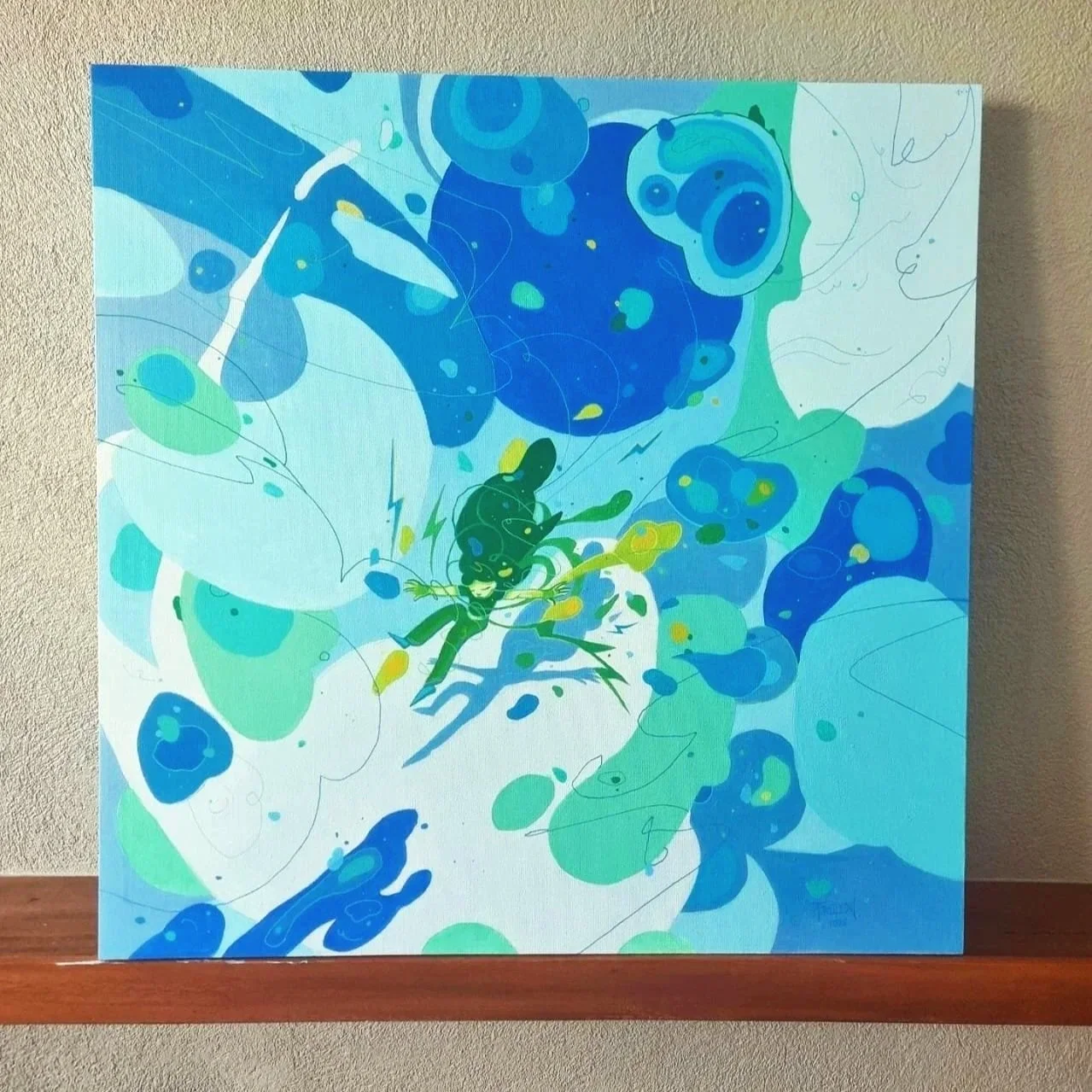 A colorful abstract painting with shades of blue, green, and yellow, featuring swirling shapes and a central figure resembling a person or character amidst the abstract patterns, mounted on a wall.