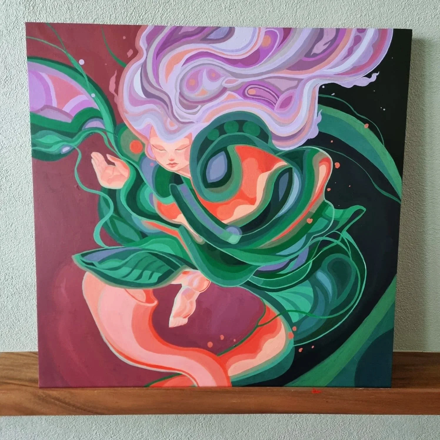 A colorful abstract painting of a figure with flowing purple hair surrounded by green leaves and swirling patterns.