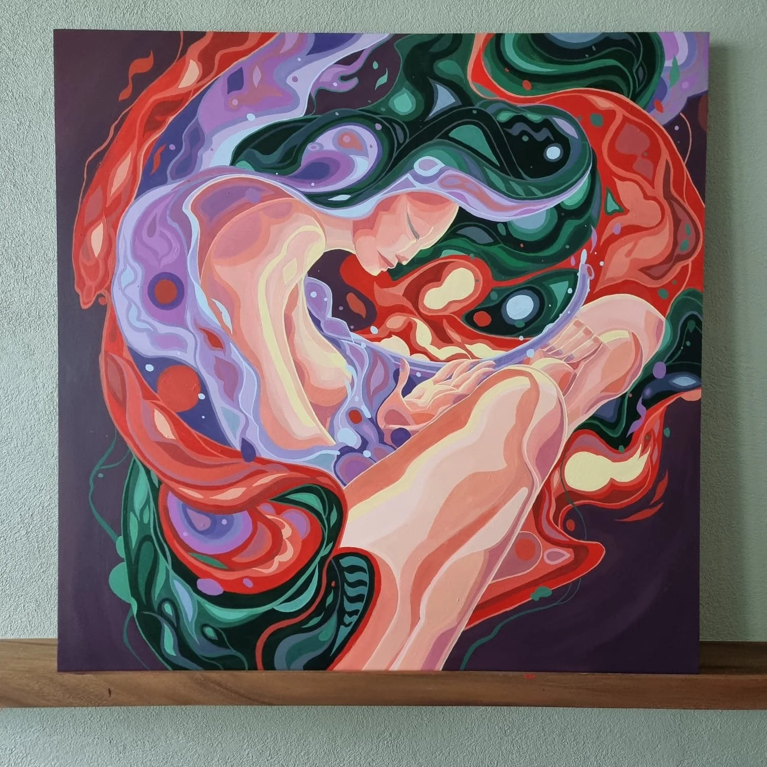 Abstract painting of a woman with long flowing green, purple, red, and orange hair, sitting with her knees pulled up and head bowed, in a swirling, colorful style.