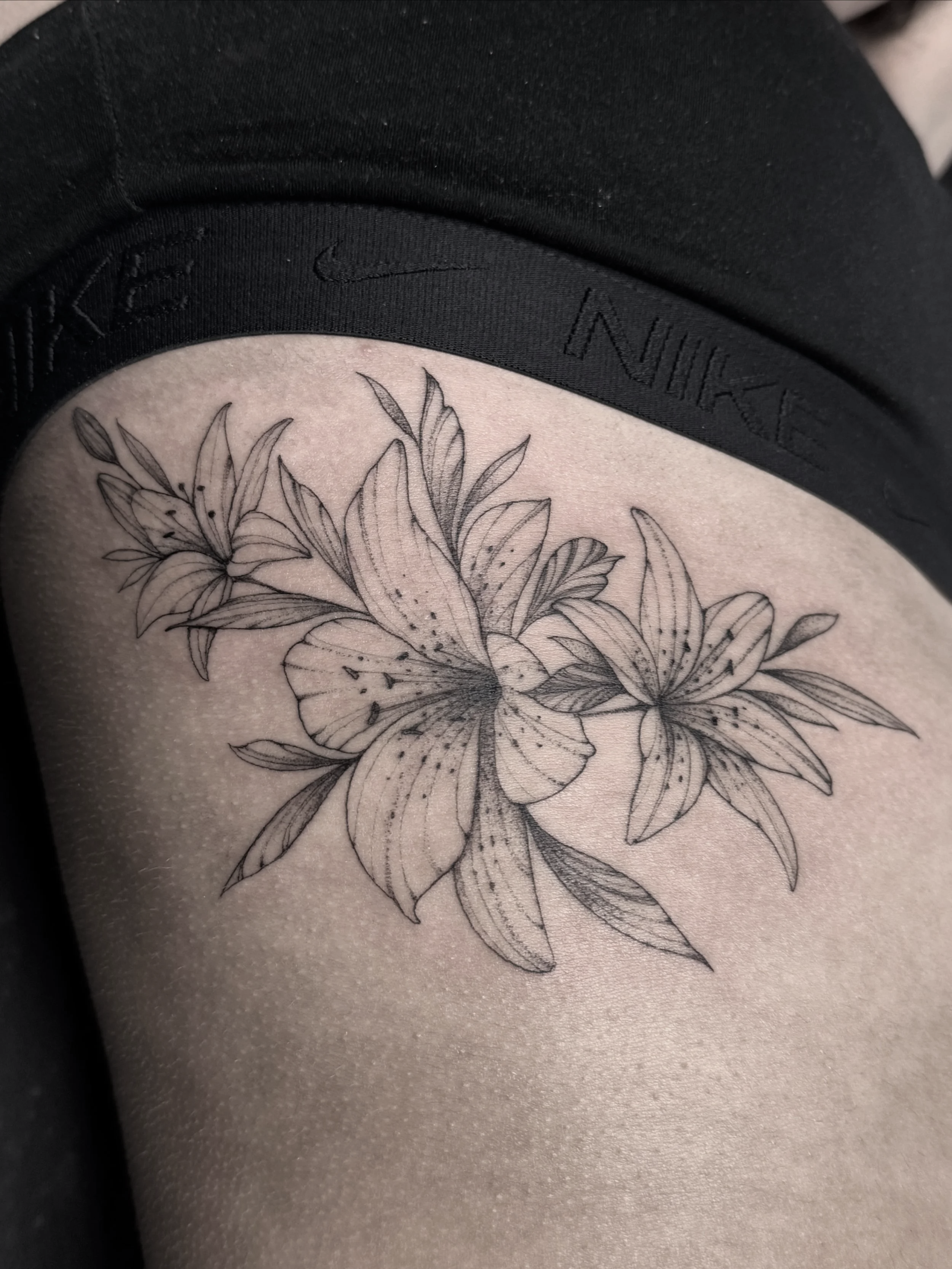 Fine line floral tattoo in Lexington Kentucky