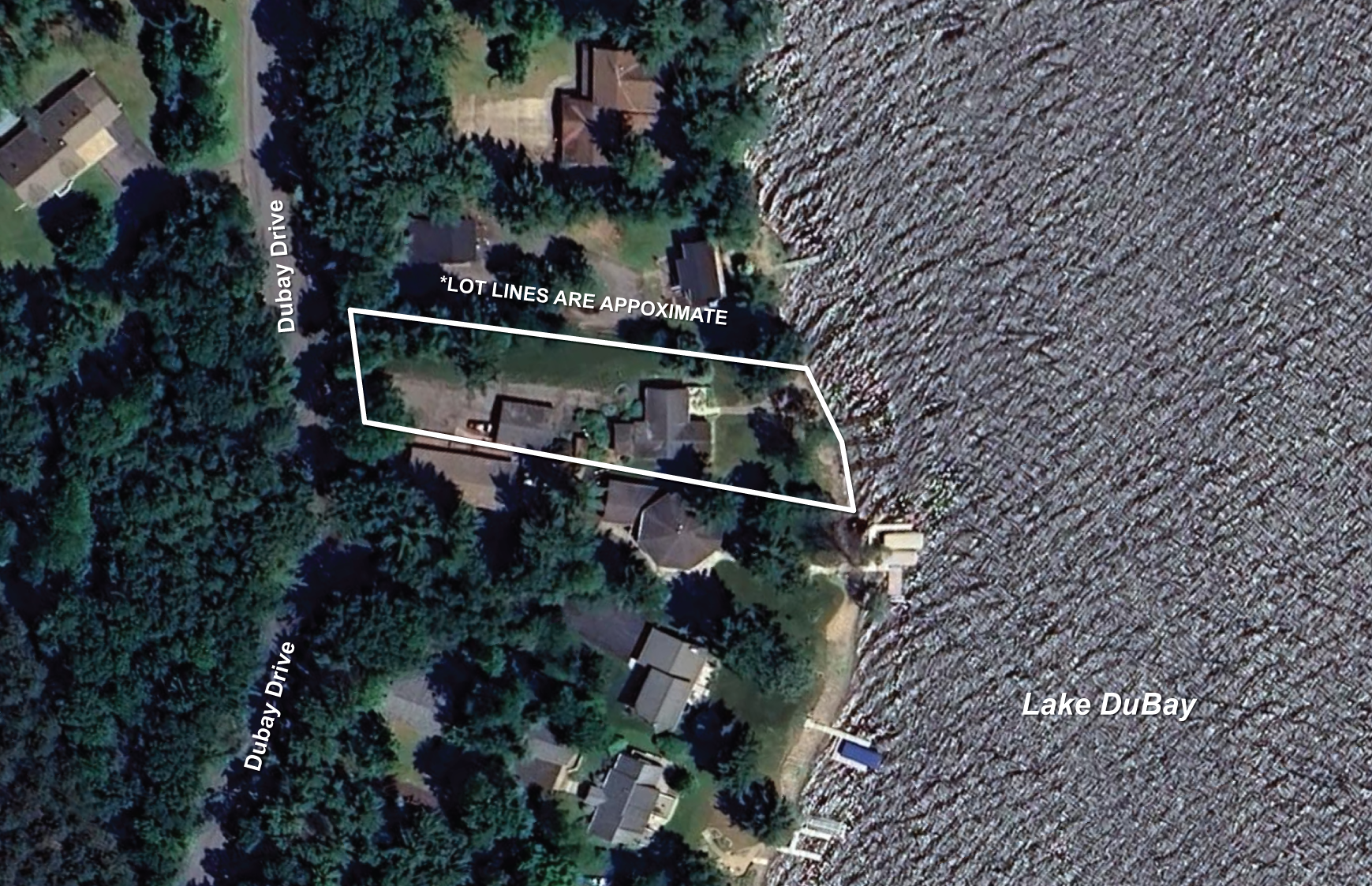 Aerial view of a residential area by Lake DuBay, with lot lines and street names marked, showing houses, trees, and the shoreline of the lake.