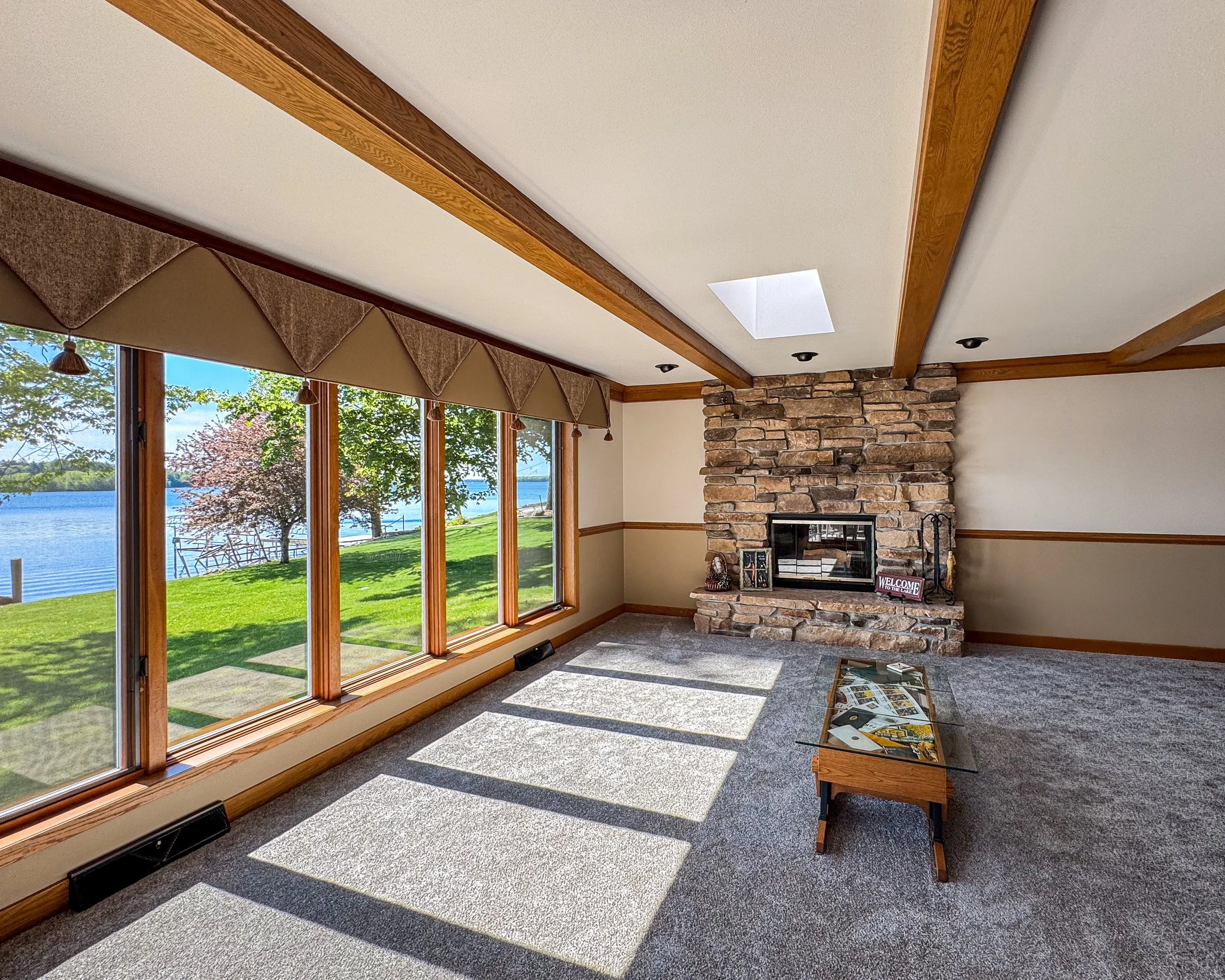 202347 Dubay Drive Fireplace and Waterfront View.jpg
