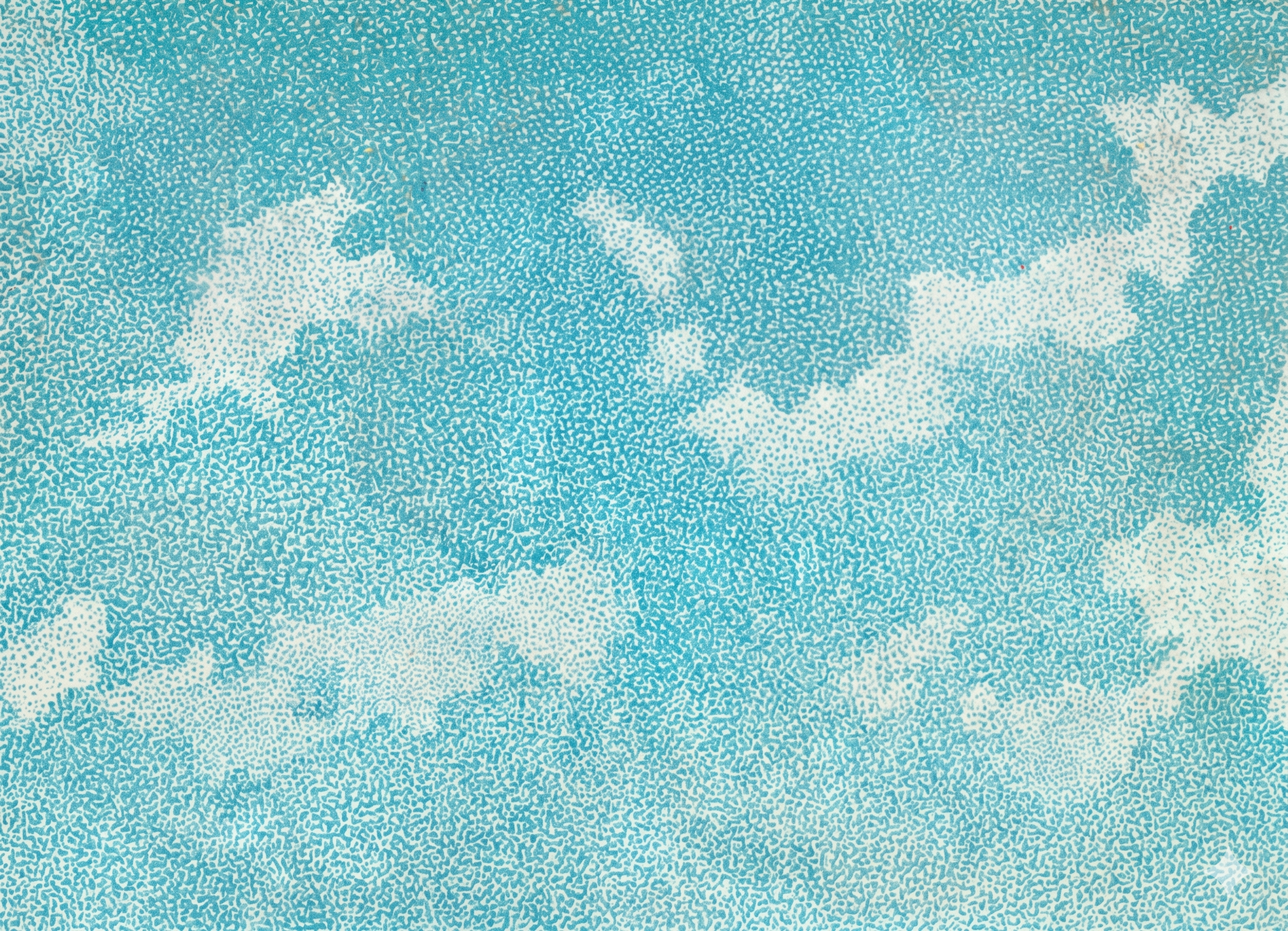 A textured blue sky with scattered white clouds.