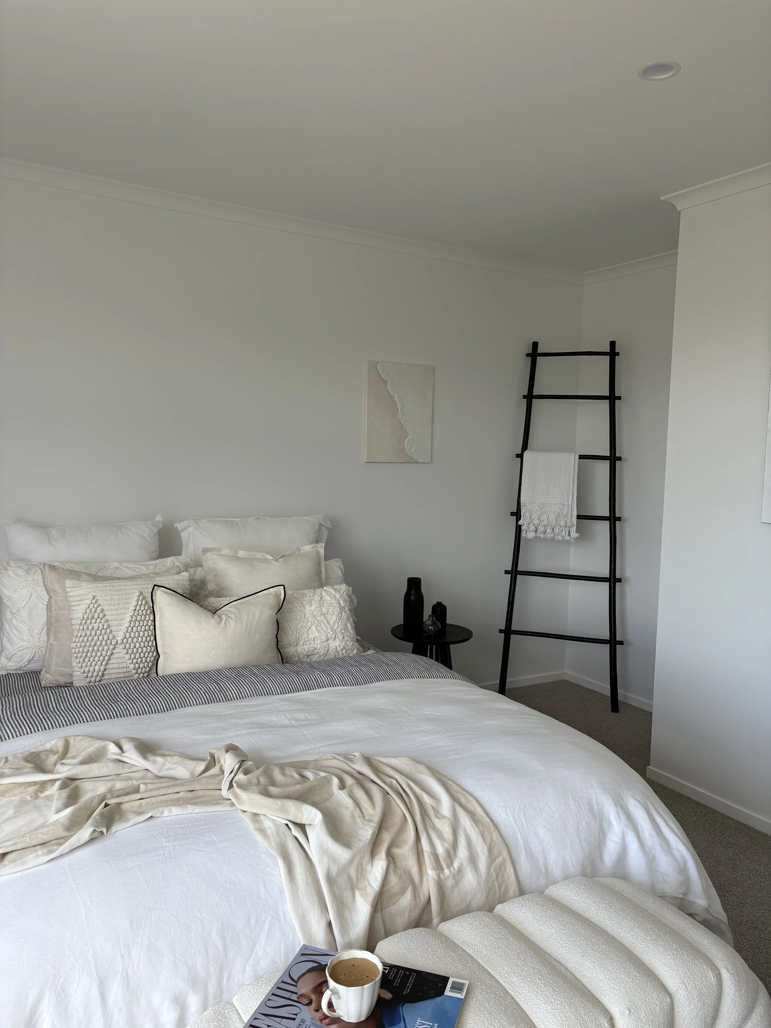 Staged Master Bedroom, White Linen Bedding, Black Accents and Blush and Beige Tones