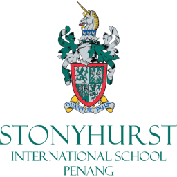 Logo of Stonyhurst International School featuring a shield, unicorn, and crest with the school name, an international school in Penang.