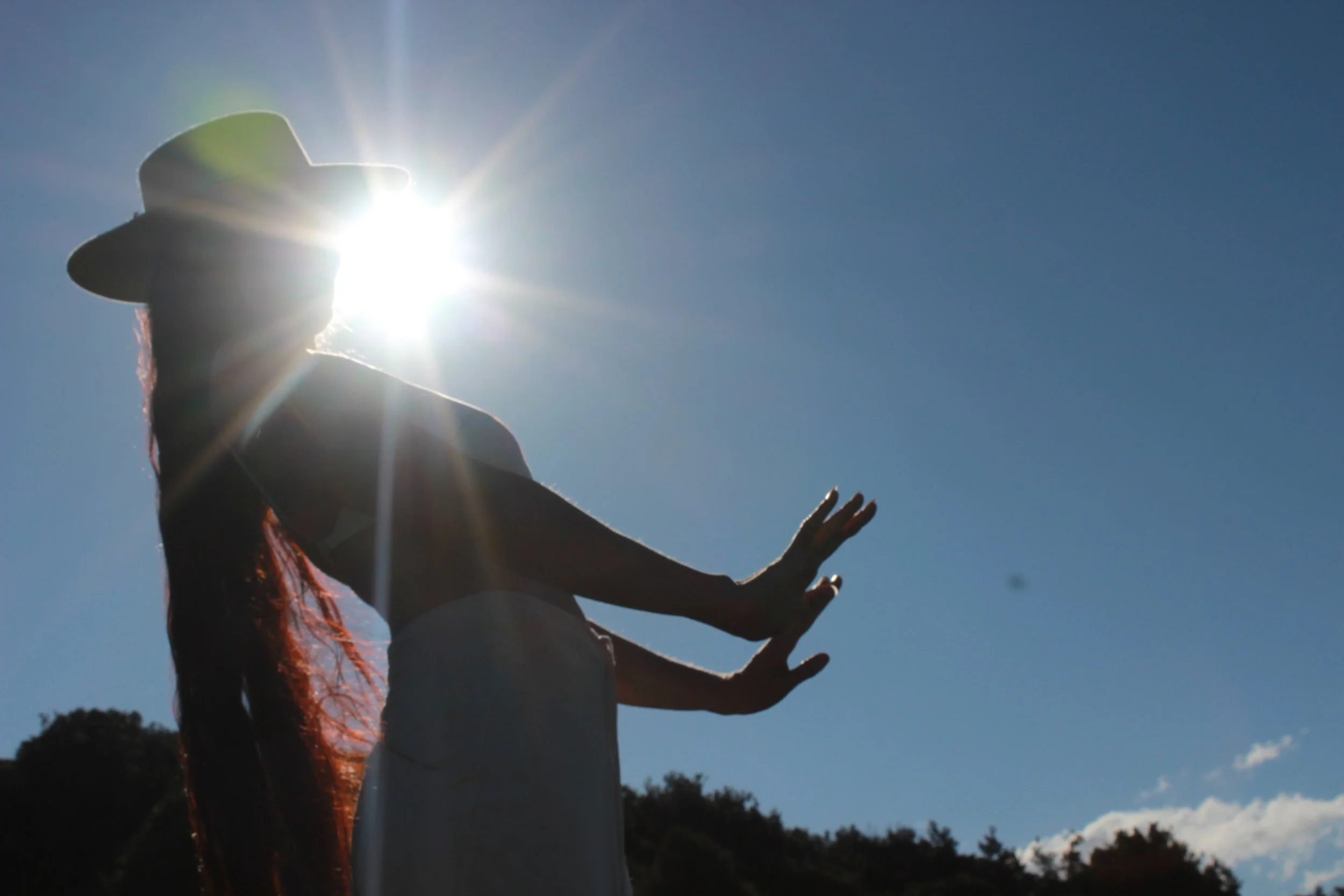 back bend sun exploding face in shadow.JPG