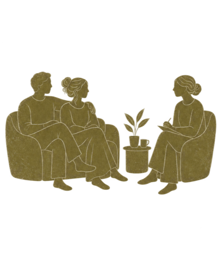 three people having a conversation, one is holding a tablet and gesturing, all sitting on armchairs.