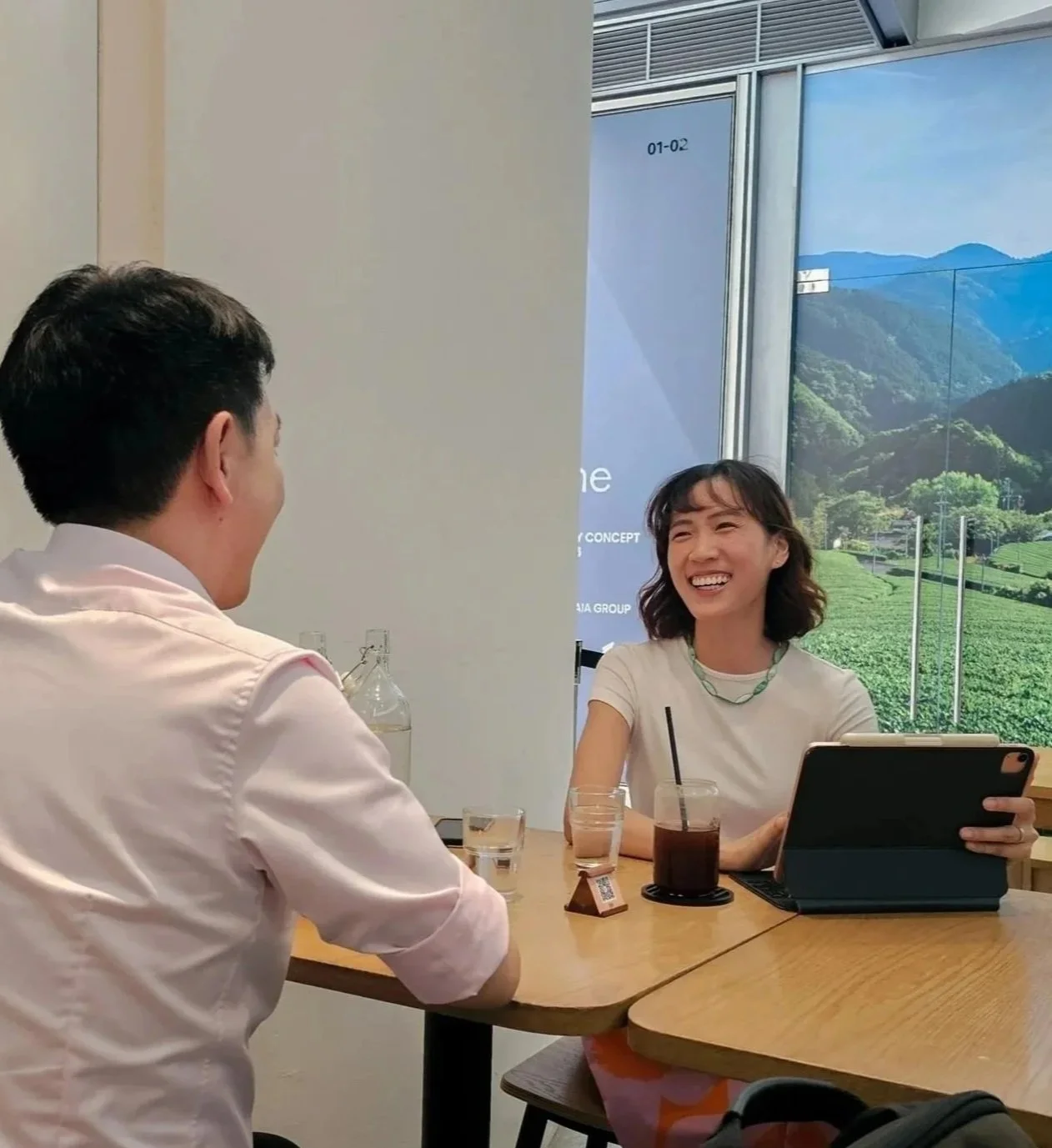 Dating coach Wan Ting is in conversation with a client