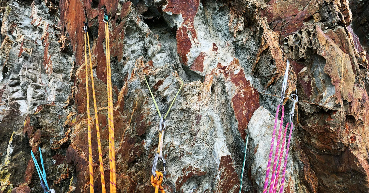 A Red Wall belay…. 7 pieces of gear equalised using both the in and out of reach methods.