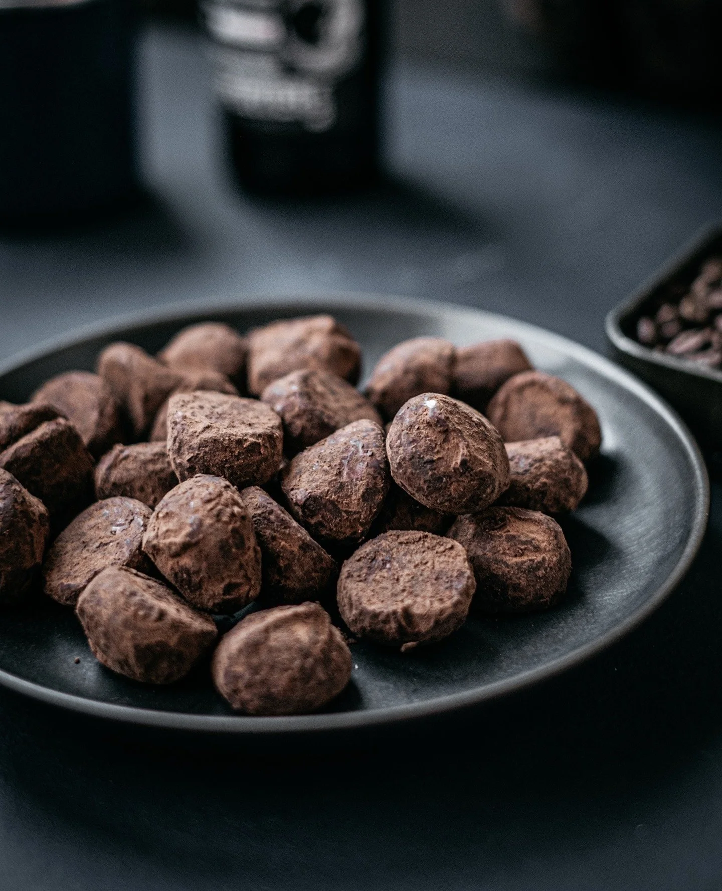 Let's make all the confectionary terms clear once and for all: ⁠
⁠
- A TRUFFLE is a round small ball made of chocolate ganache that is usually rolled in cocoa powder. It is soft, round, and has no hard shell. ⁠
⁠
- A PRALINE  is a bonbon characterize