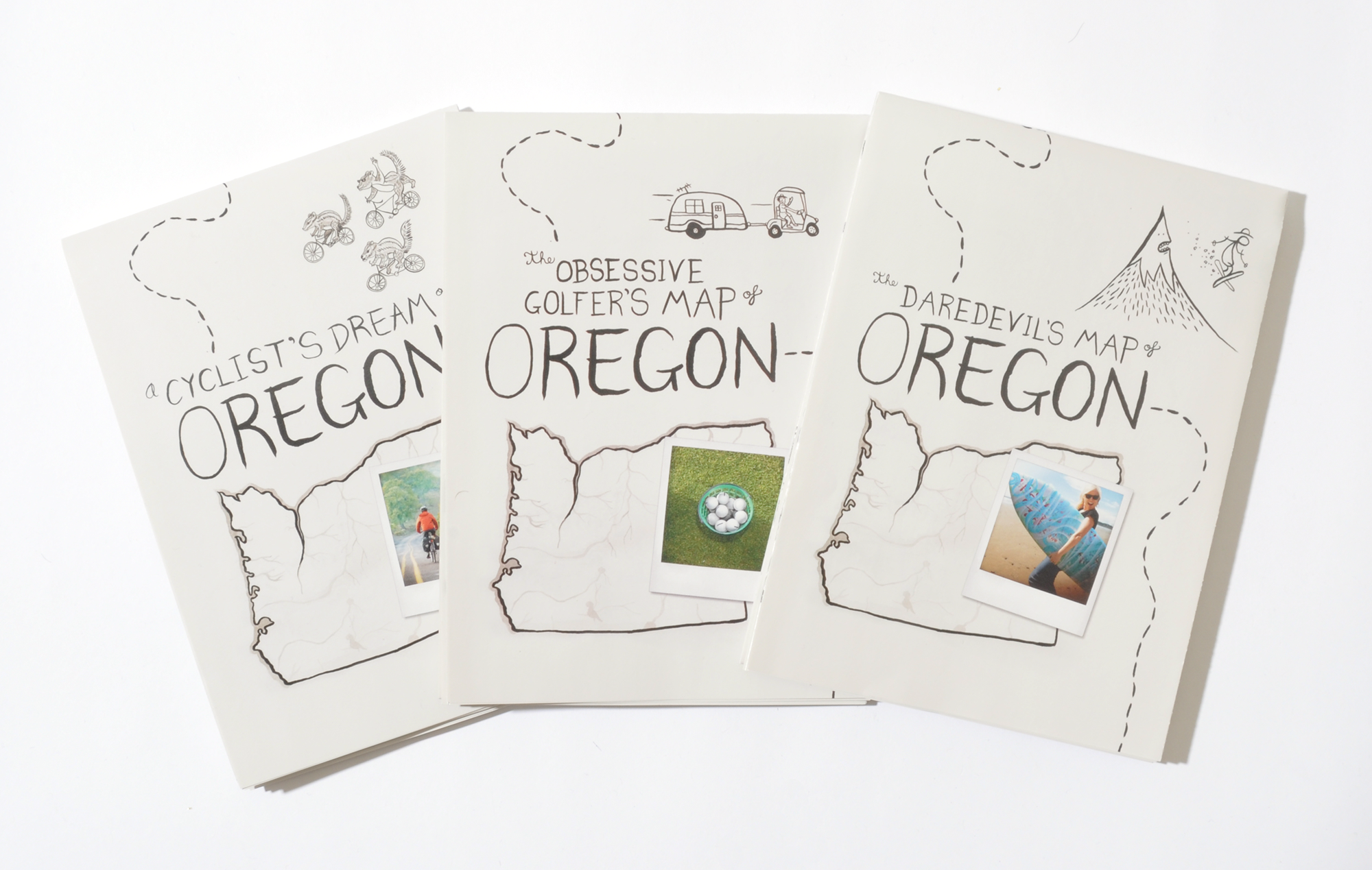 Three white sheets of paper with Oregon-themed illustrations and photographs. Each sheet features a hand-drawn map outline of Oregon and travel-related drawings, such as a cyclist, a camper van, a mountain with a skier, and photos of outdoor activities.