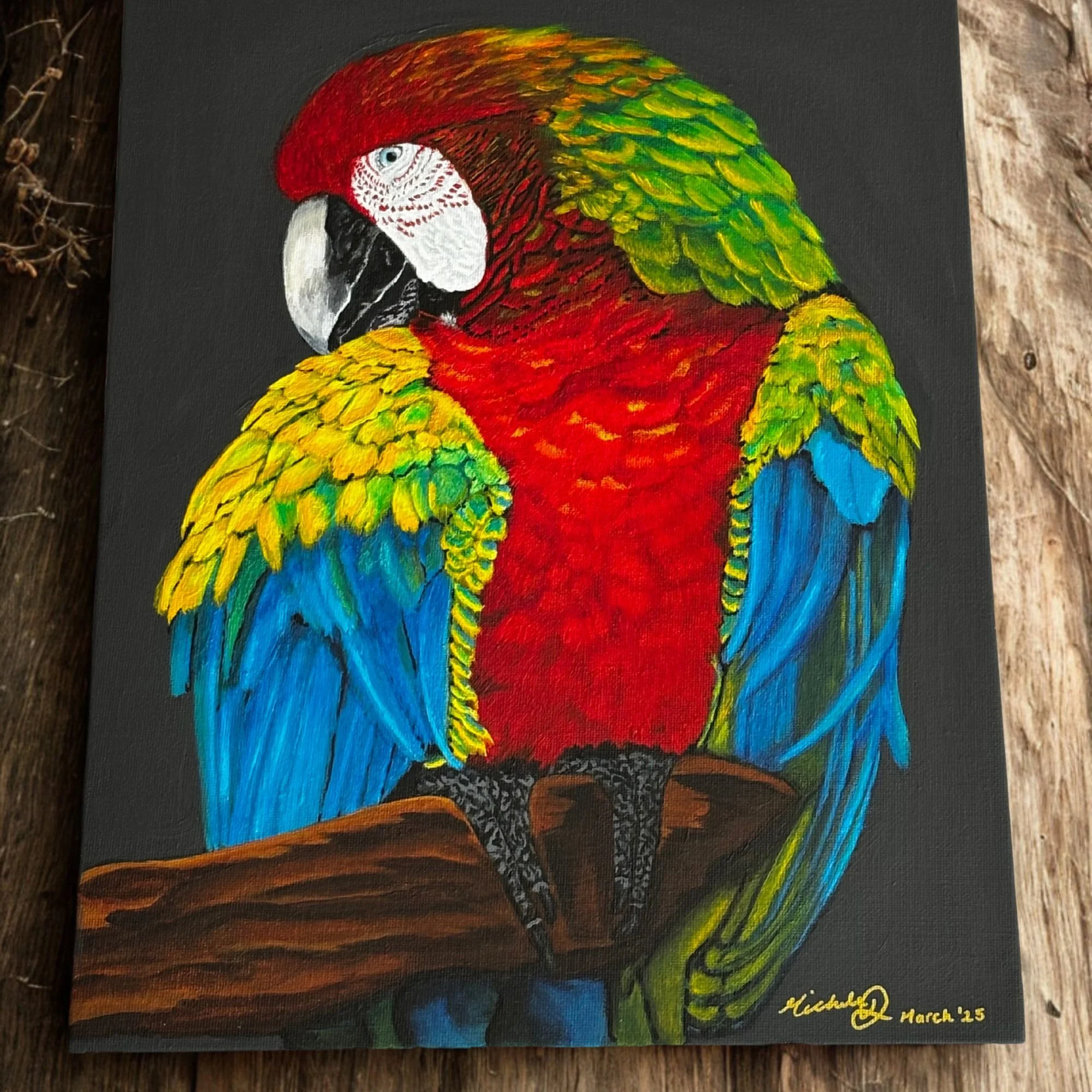 Colorful painting of a green, red, and blue parrot perched on a branch, with a black background.
