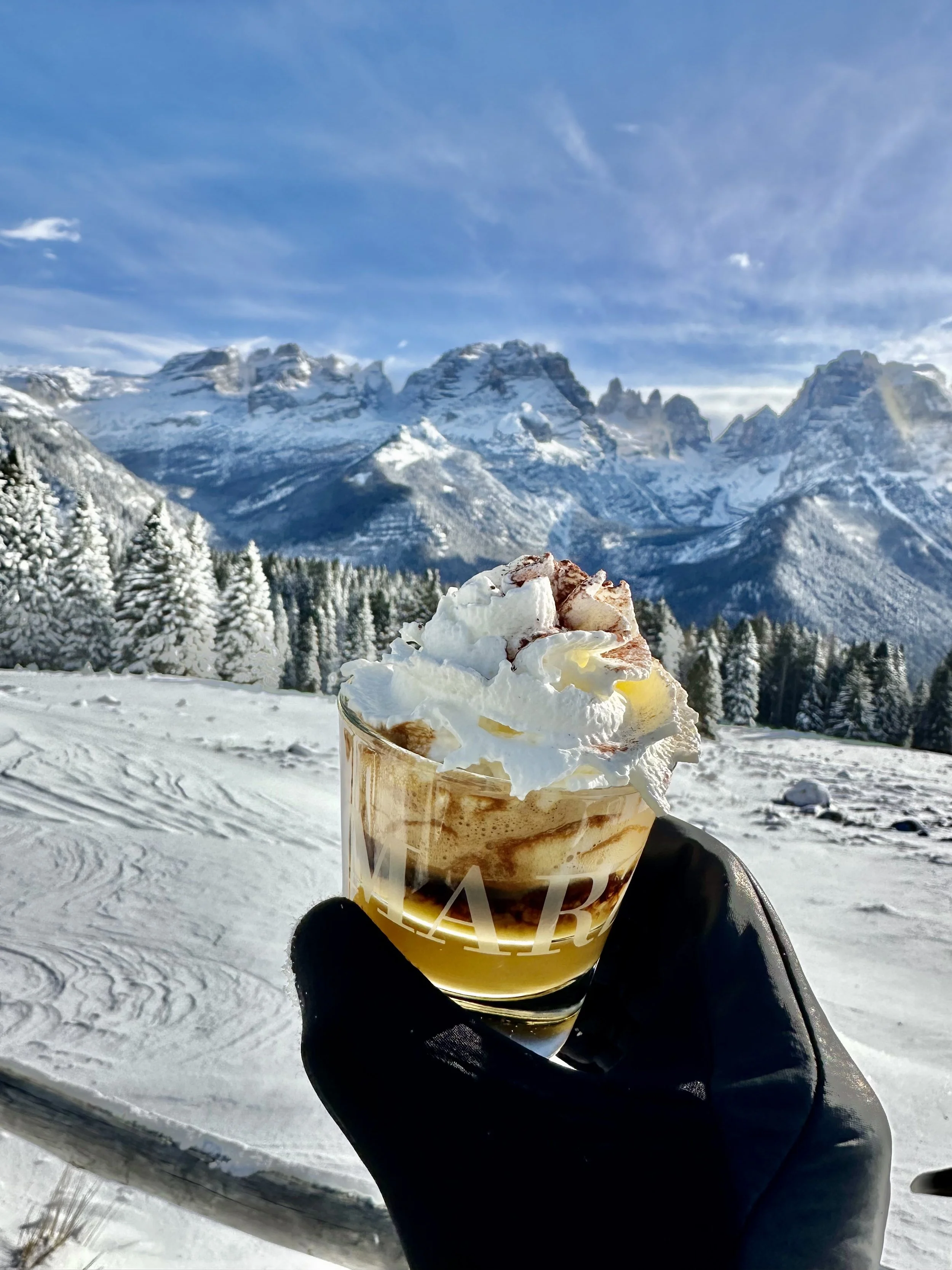Hot drink with snow mountain view