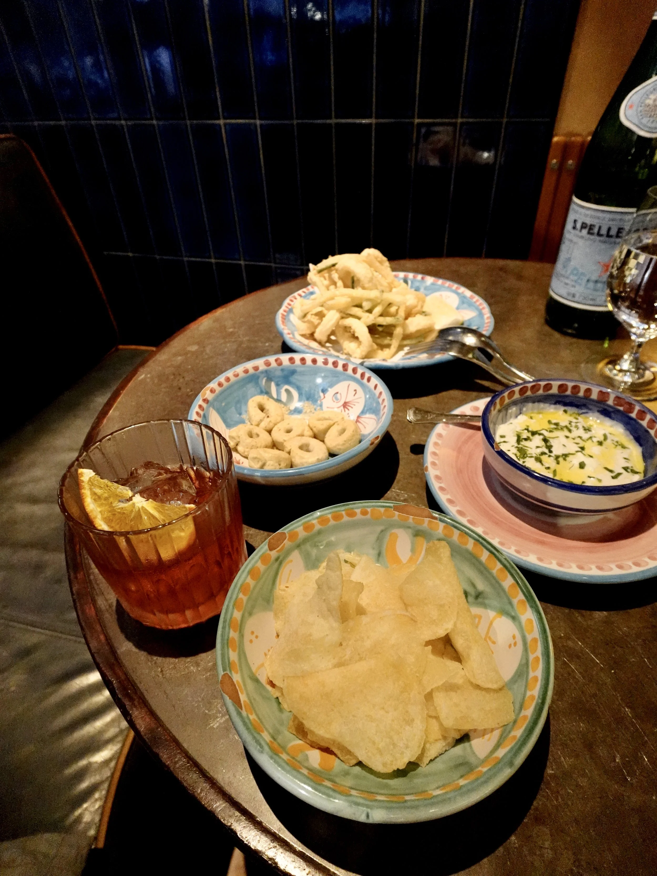 Negroni, calamari fritti, taralli and snacks served for aperitivo at Osteria Marzia Hong Kong