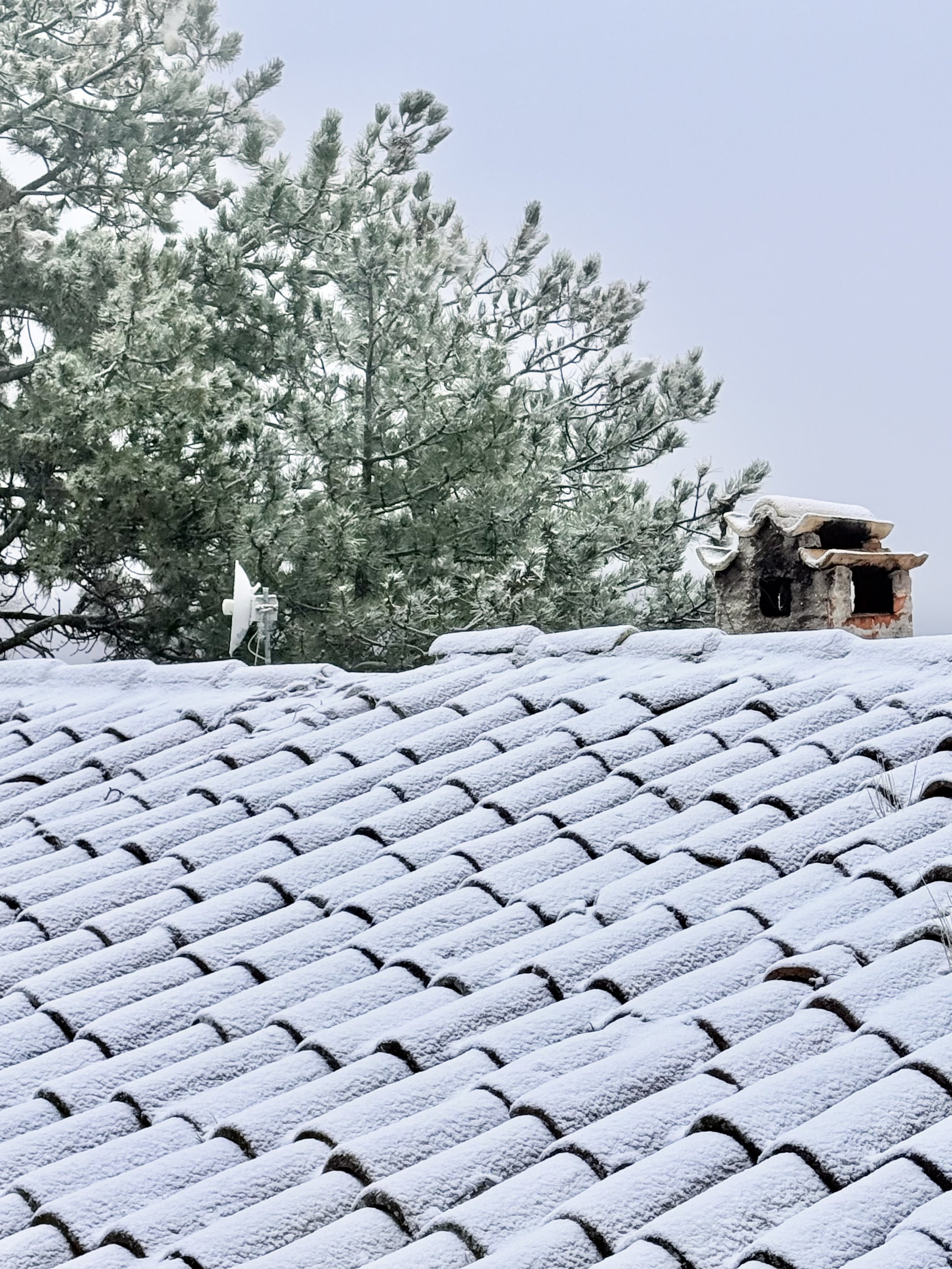 Snow-dusted rooftops in rural Umbria