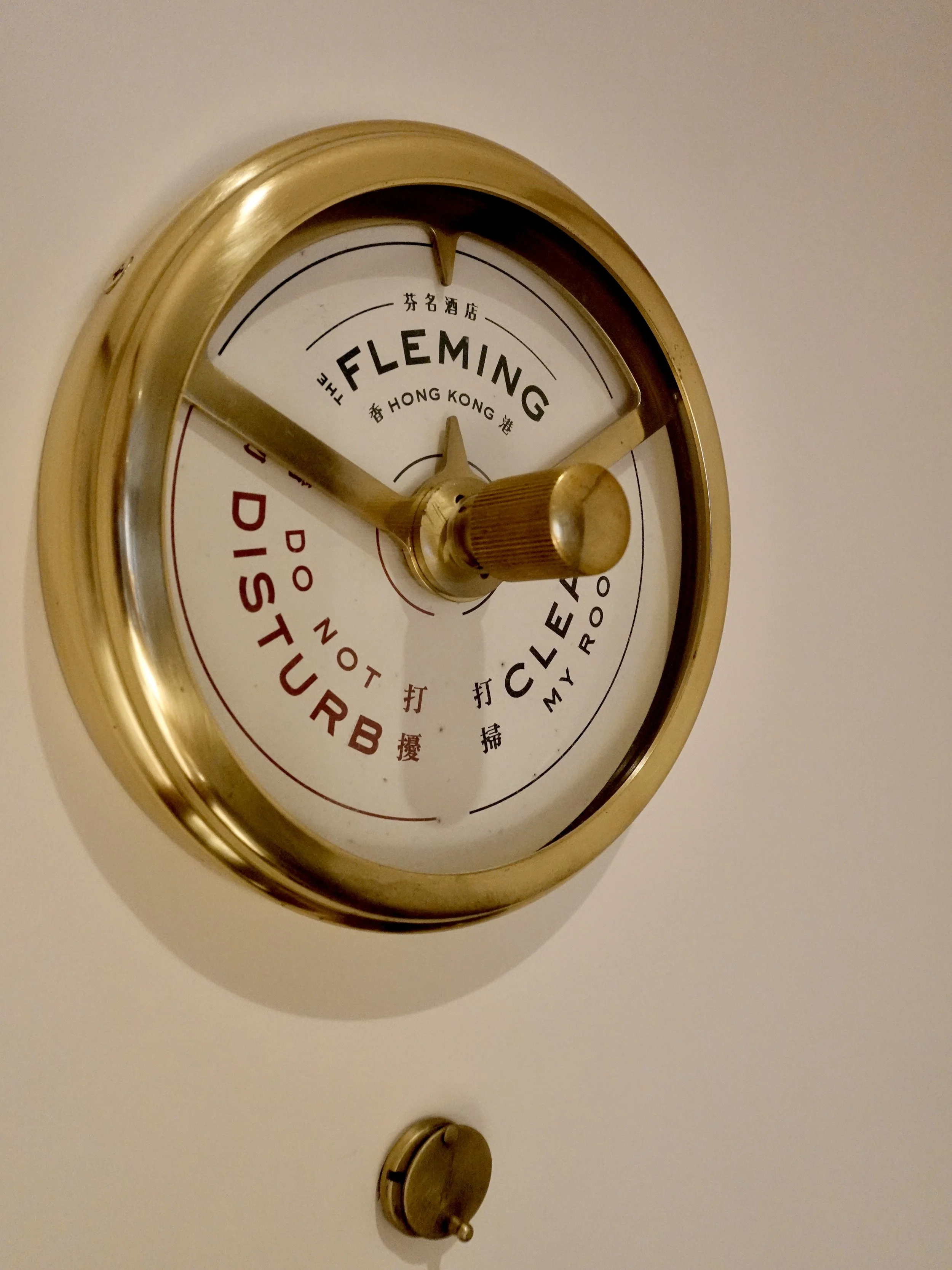 Brass Do Not Disturb and Clean My Room dial inside a room at The Fleming Hong Kong