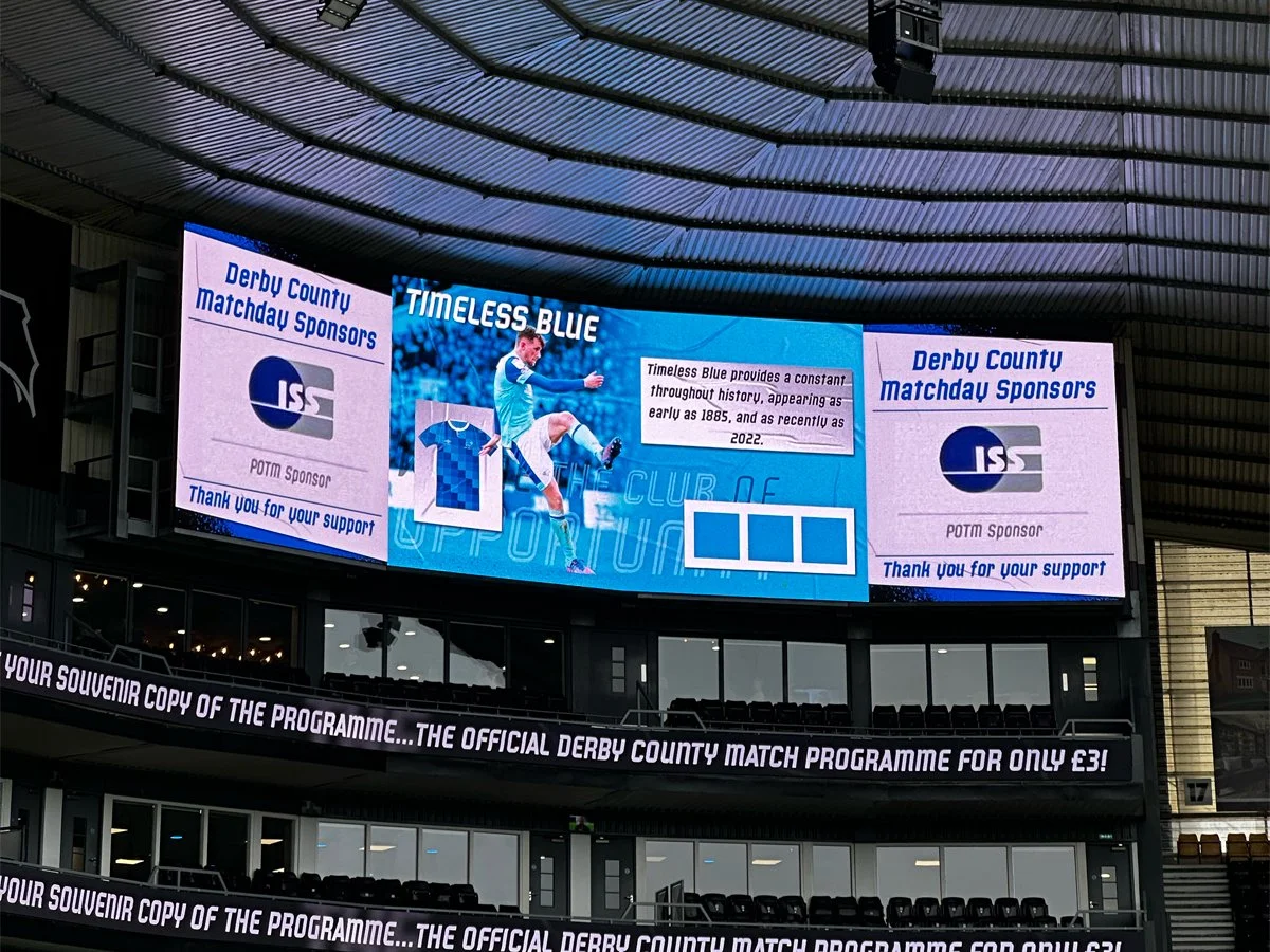 ISS logo proudly displayed on the big screen at Pride Park Stadium.