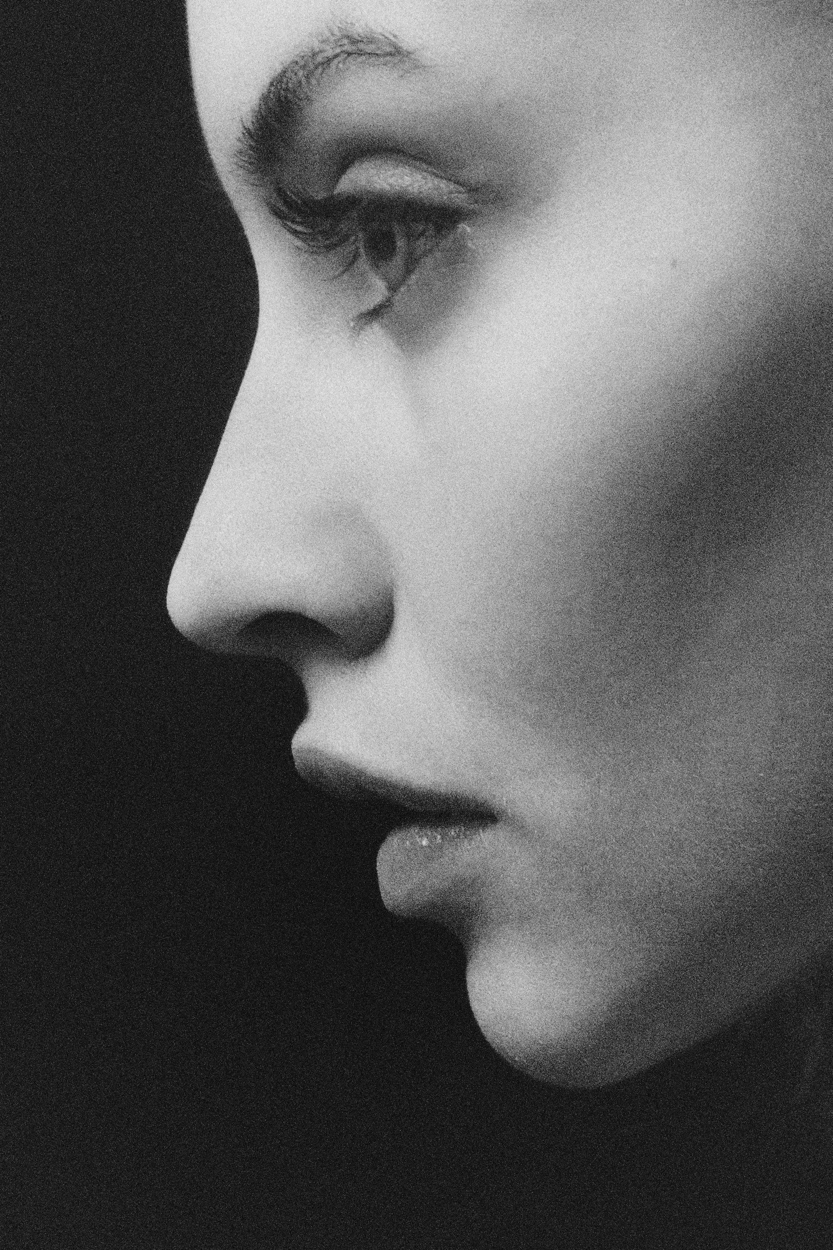 Black and white close-up portrait of a woman's profile — advanced facial treatments at Skinor, Chelsea