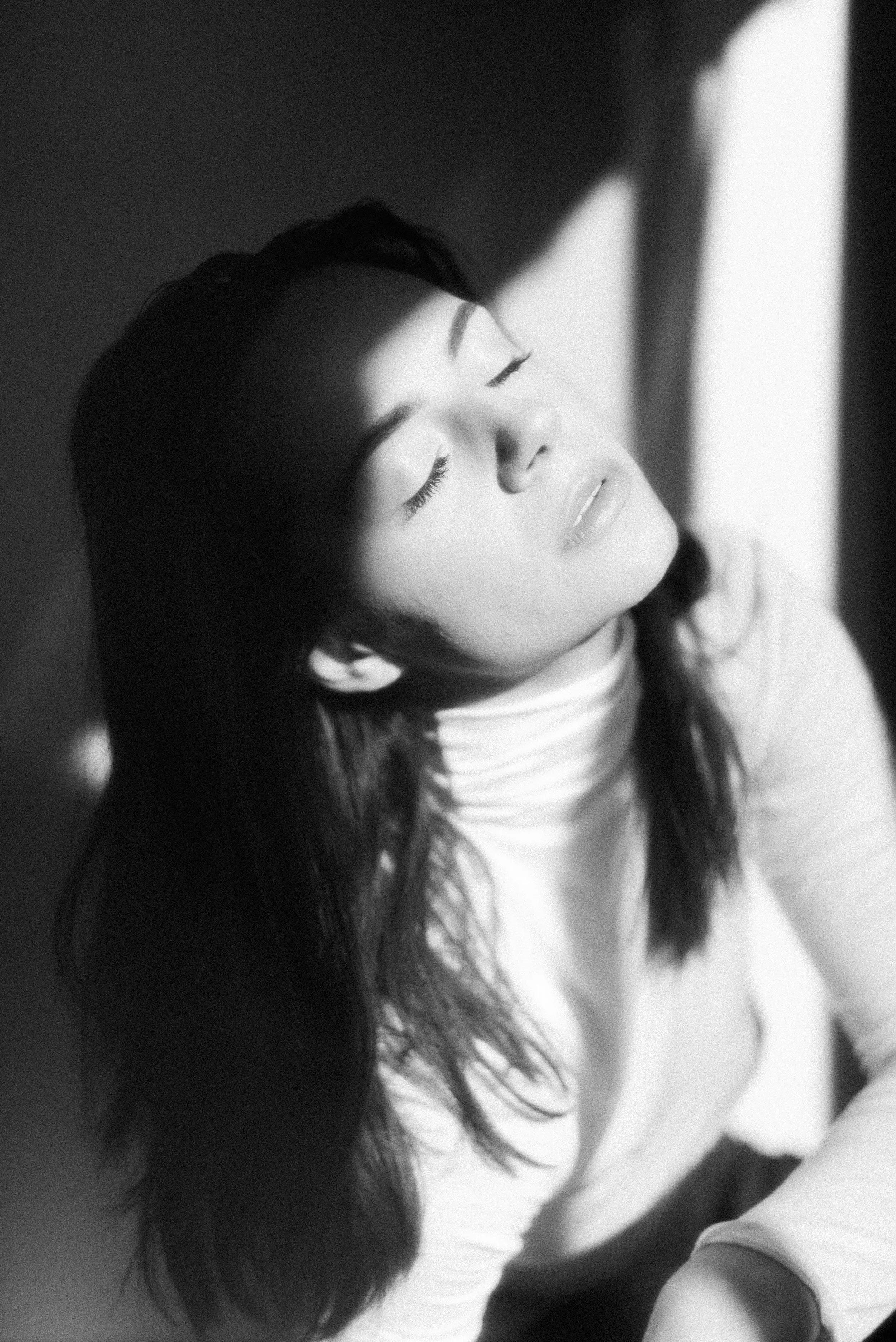 Woman in natural window light — Skinor boutique skin clinic, Chelsea