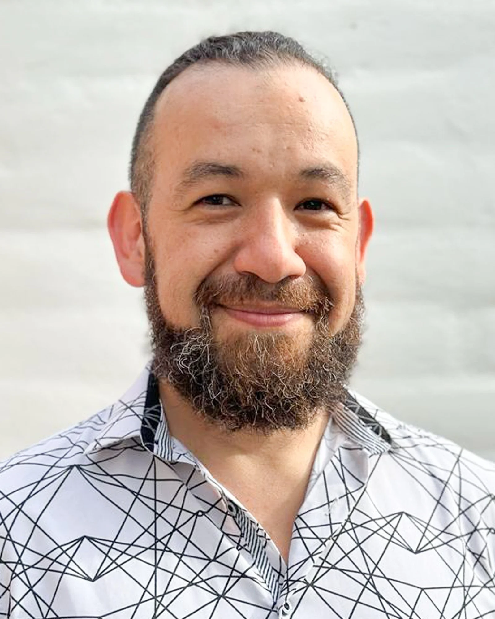 A portrait of Martín Chamorro, one of the speakers at the AI in translation summit. The AI in Translation Summit is a FREE virtual event for translators diving deep into the industry-specific aspects of AI so you can stay relevant, and thrive