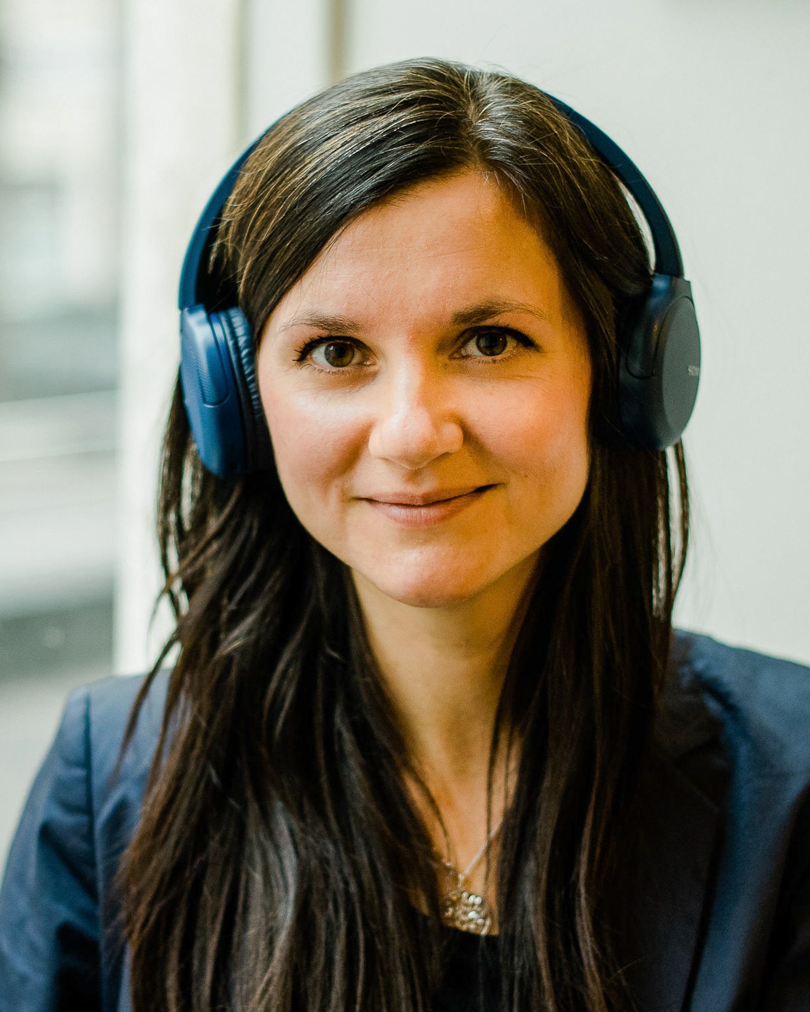 A portrait of Veronika Malaja, one of the speakers at the AI in translation summit. The AI in Translation Summit is a FREE virtual event for translators diving deep into the industry-specific aspects of AI so you can stay relevant, and thrive
