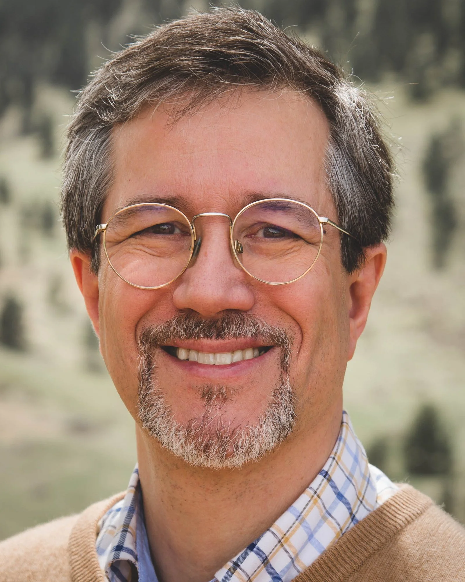 A portrait of Riccardo Schiaffino, one of the speakers at the AI in translation summit. The AI in Translation Summit is a FREE virtual event for translators diving deep into the industry-specific aspects of AI so you can stay relevant, and thrive