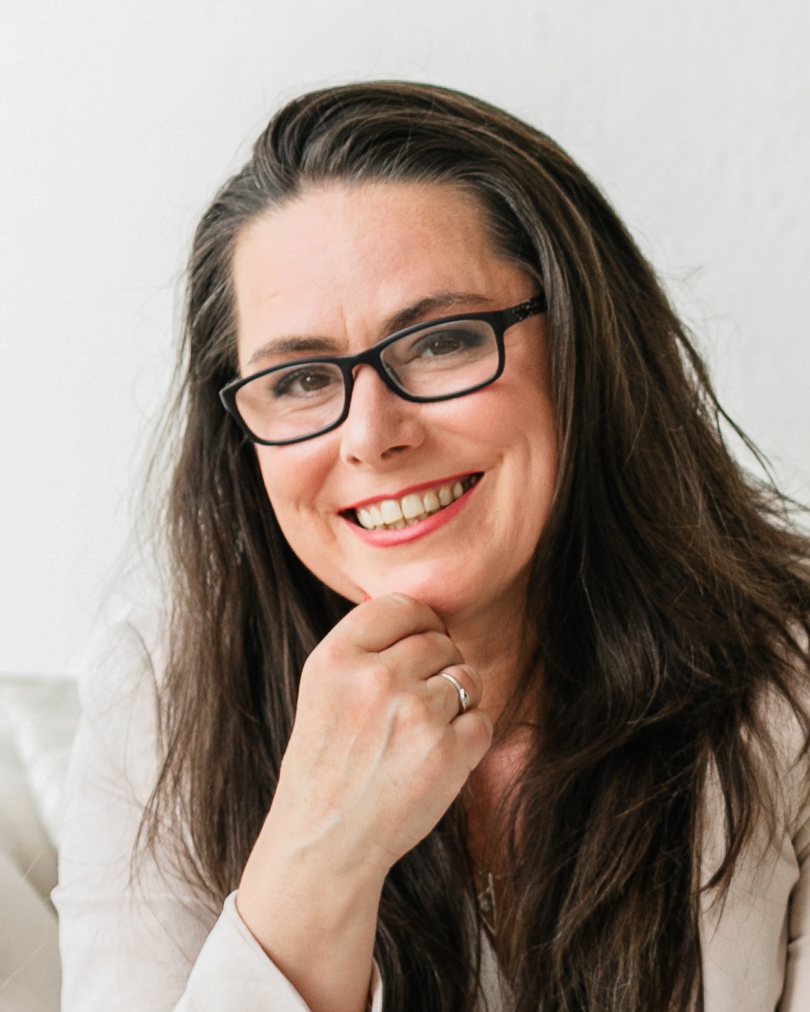 A portrait of Tanya Quintieri, a speaker at the AI in translation summit. The AI in Translation Summit is a FREE virtual event for translators diving deep into the industry-specific aspects of AI so you can stay relevant, and thrive