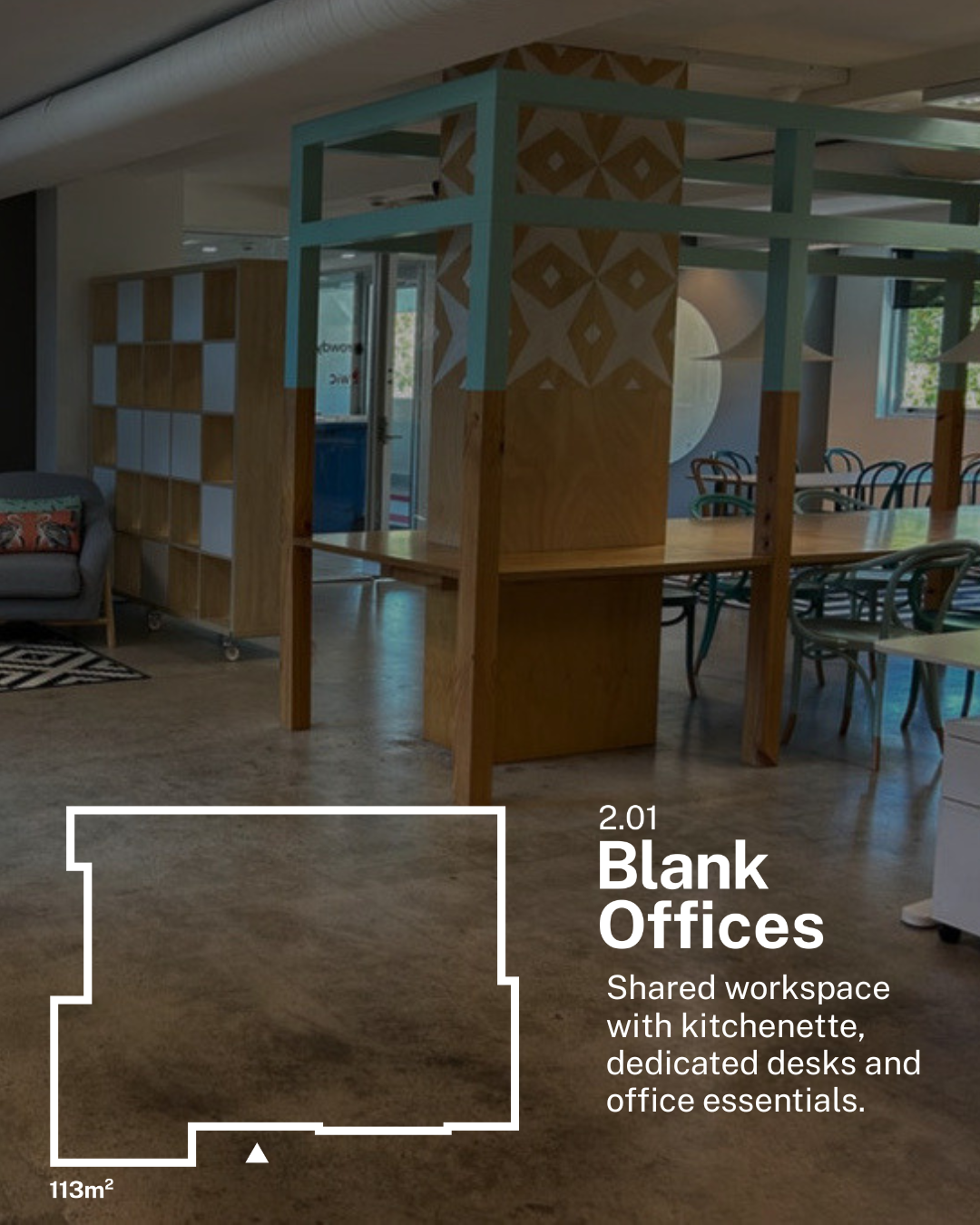 Interior of a shared workspace with wooden structures, shelves, a table, chairs, and windows, labeled as 'Blank Offices' with 113 square meters area.