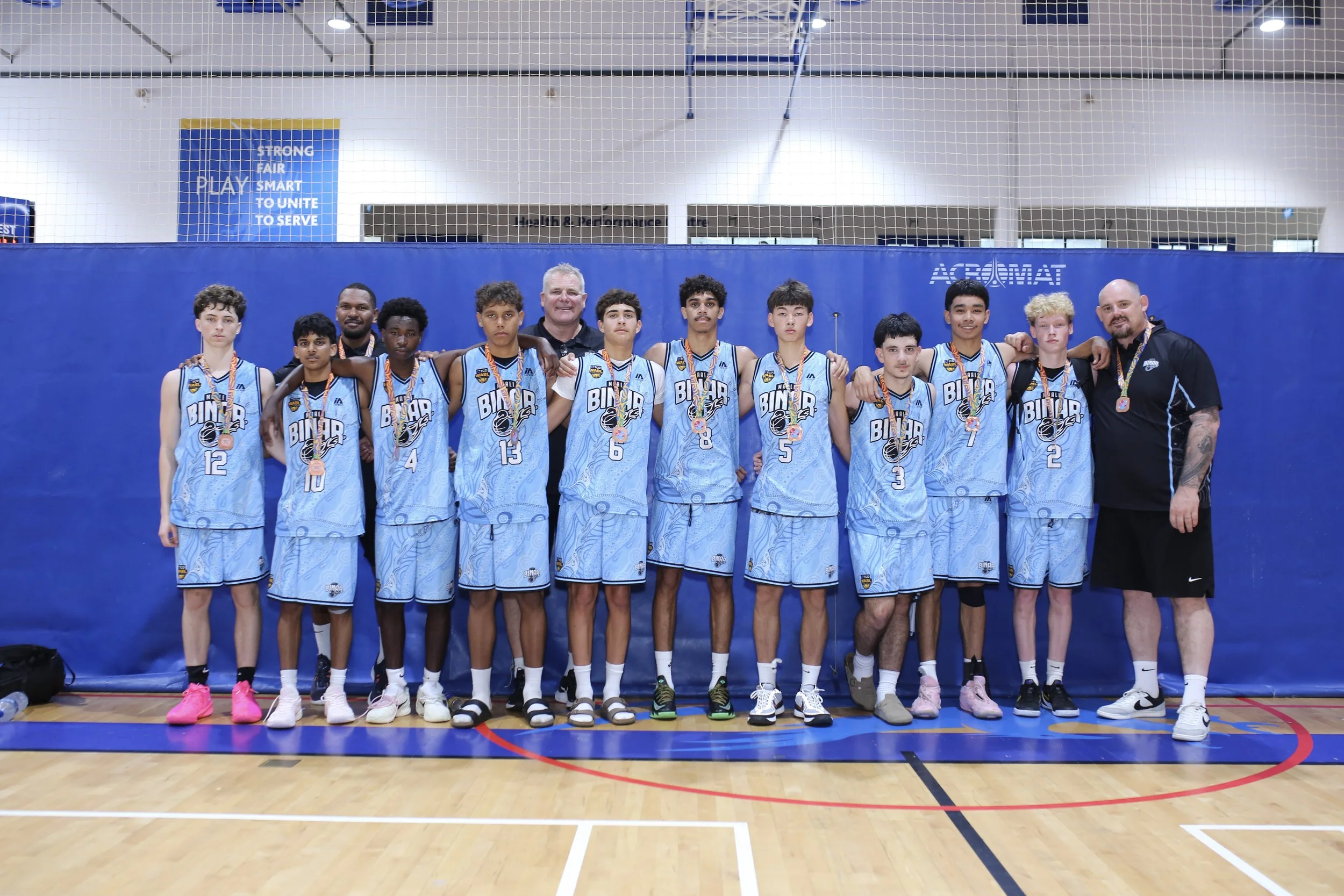 Binar U16 boys team wearing their Bronze medals at the Asia Pacific Cup in Singapore
