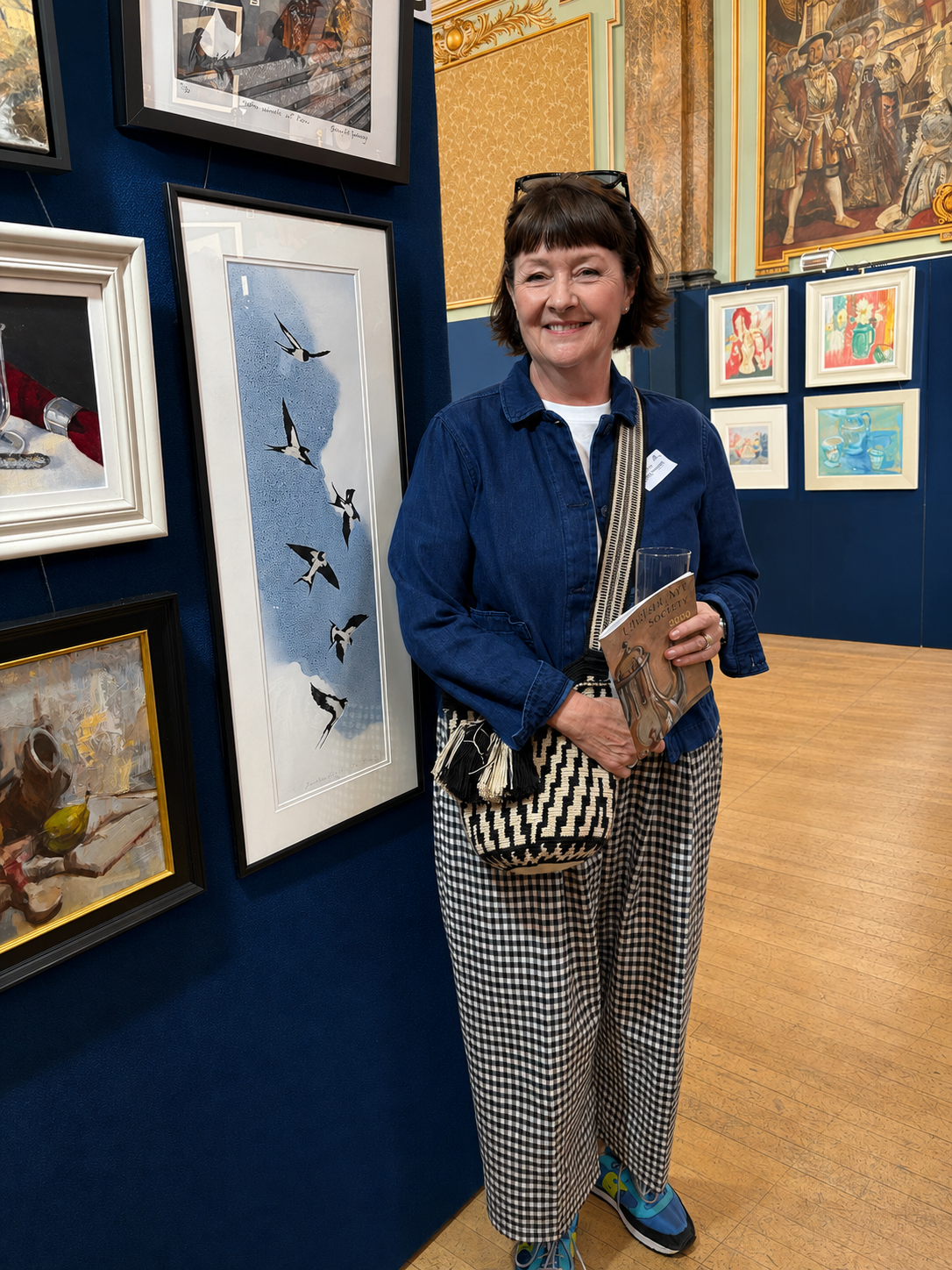 Diana Howorth, artist and printmaker, at an exhibition.