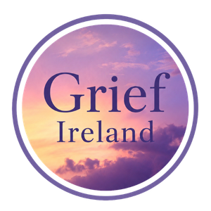 A circular logo with a purple and pink sky background and the words 'Grief Ireland' in the center.