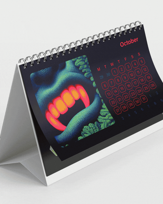 A desk calendar displaying the month of October with a digital illustration of a mouth with sharp teeth and a snake tongue.