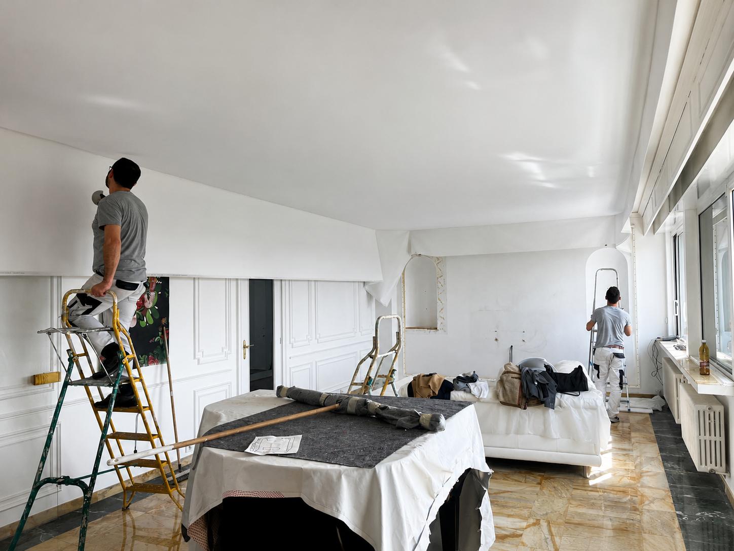 équipe forca peinture entrain de réaliser un plafond tendu à Metz