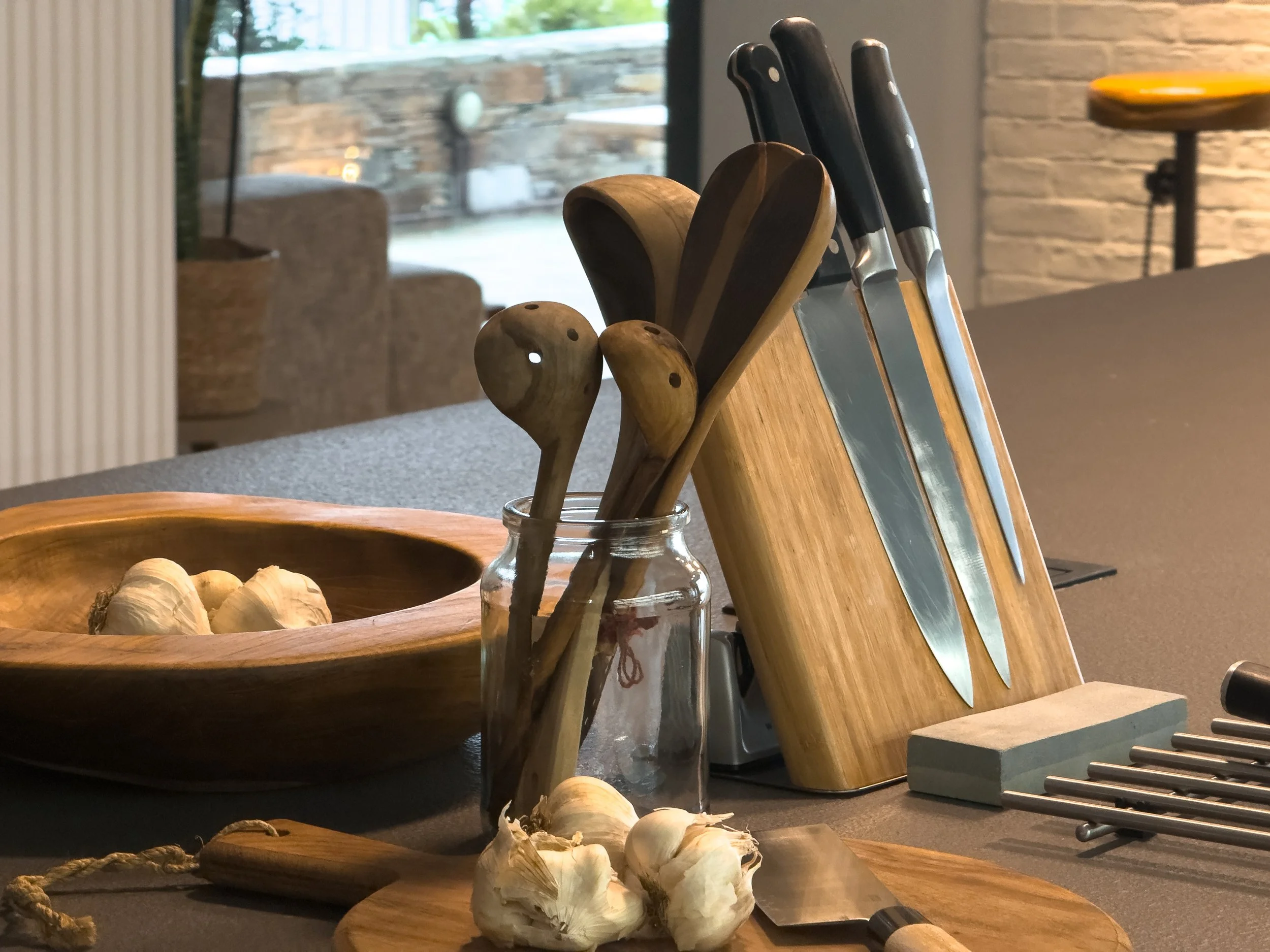 Warm culinary corner blending organic textures and intentional everyday living at Astraea Villa.