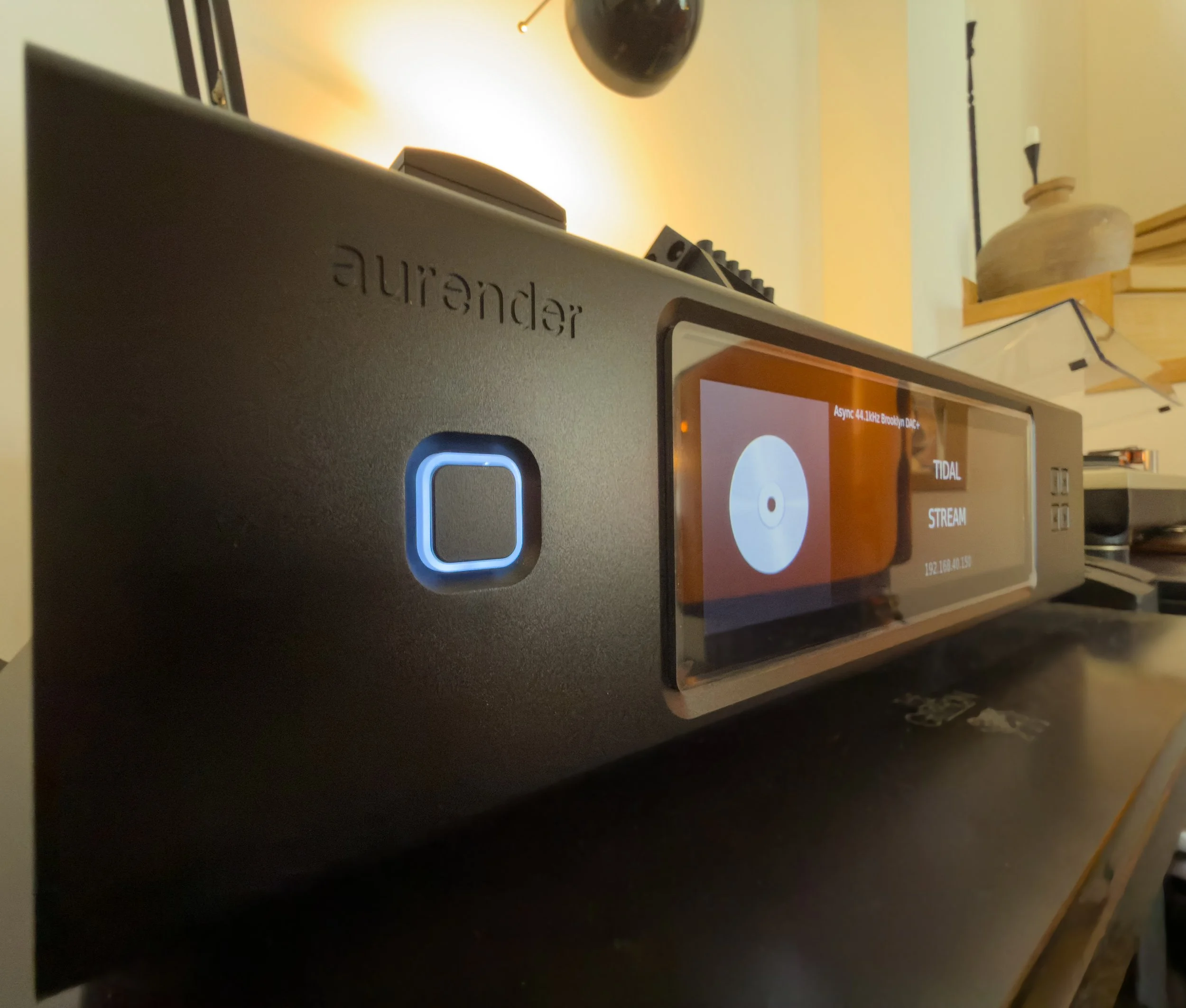 Thoughtfully curated audio setup with warm creative atmosphere at Astraea Villa.