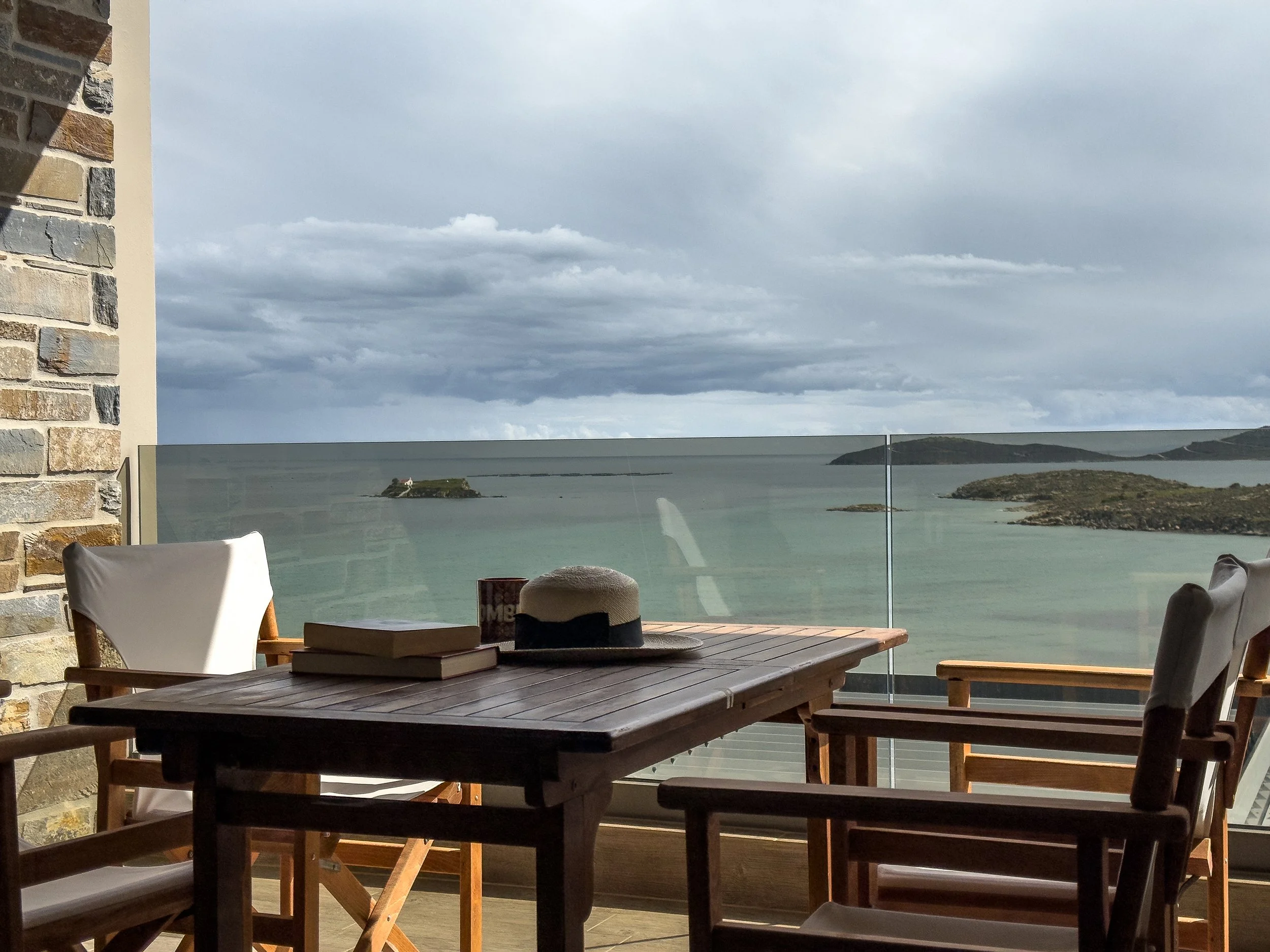 Open-air veranda shaped by sea views, natural light and slow coastal living at Astraea Villa.