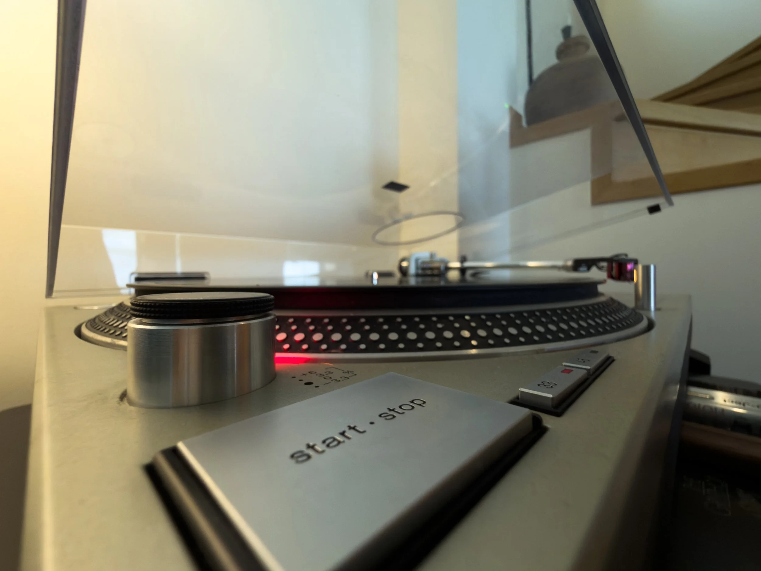Thoughtfully styled vinyl listening detail shaped by music and quiet contemporary living at Astraea Villa.