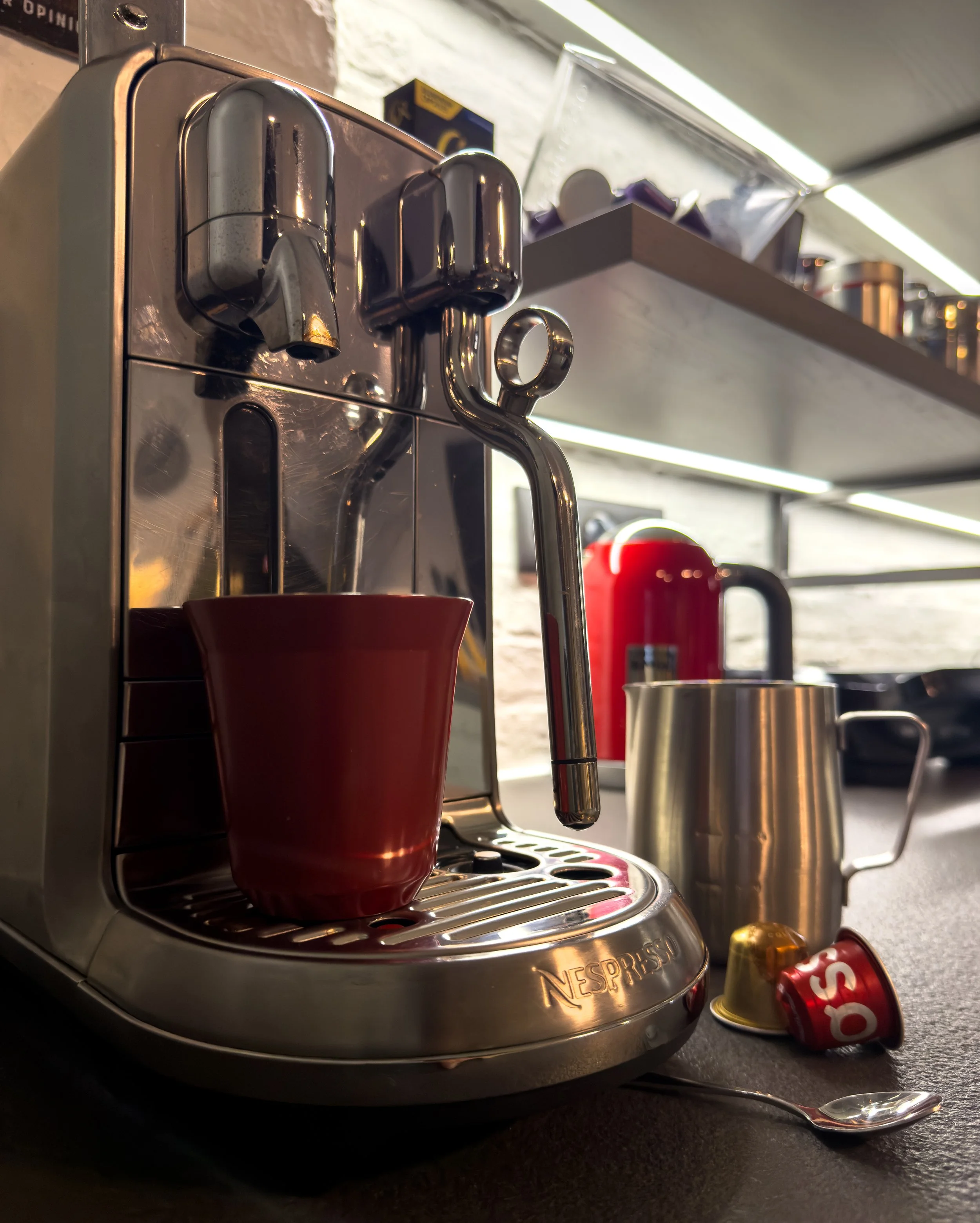 Refined Nespresso coffee station with curated details and contemporary kitchen character at Astraea Villa.