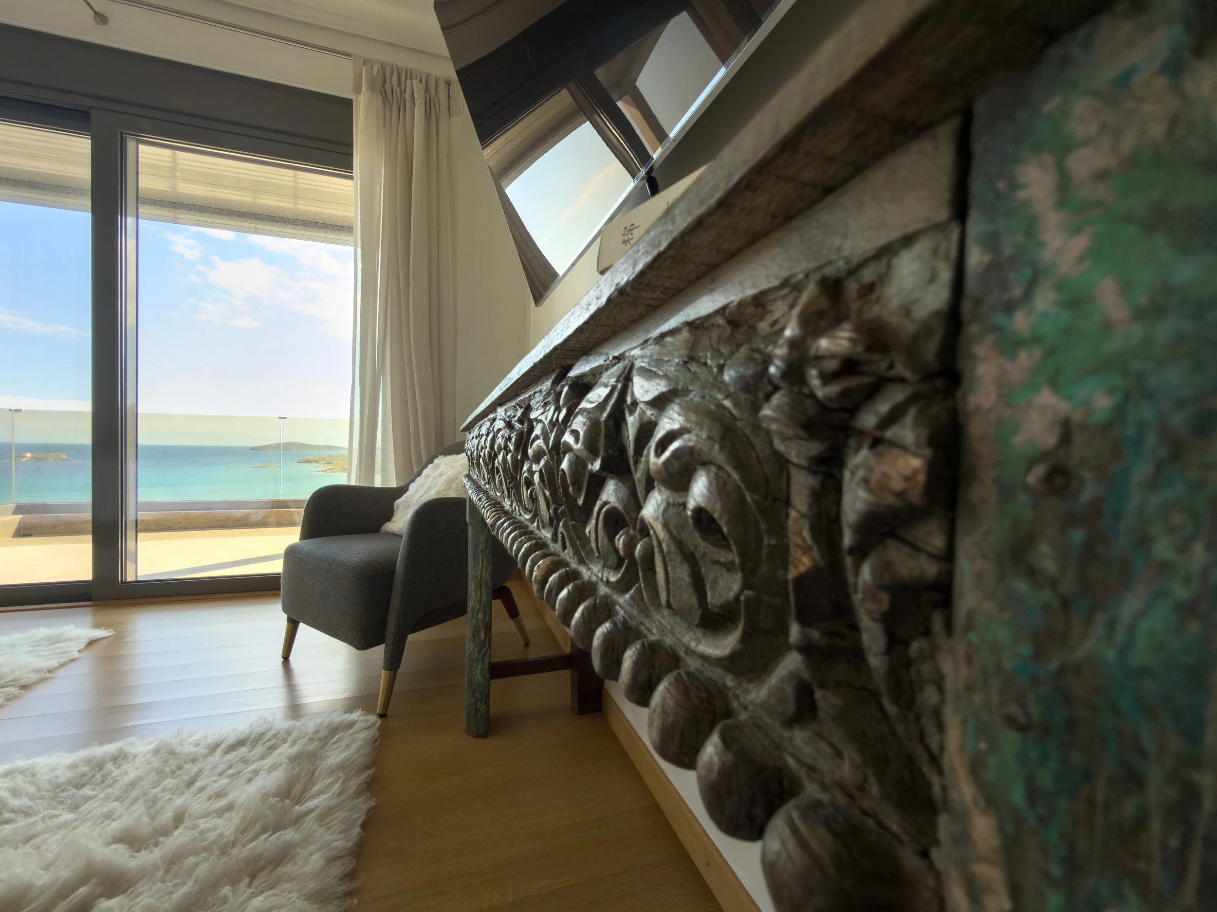 Living spaces designed around stillness, light and the rhythm of the sea at Astraea Villa.