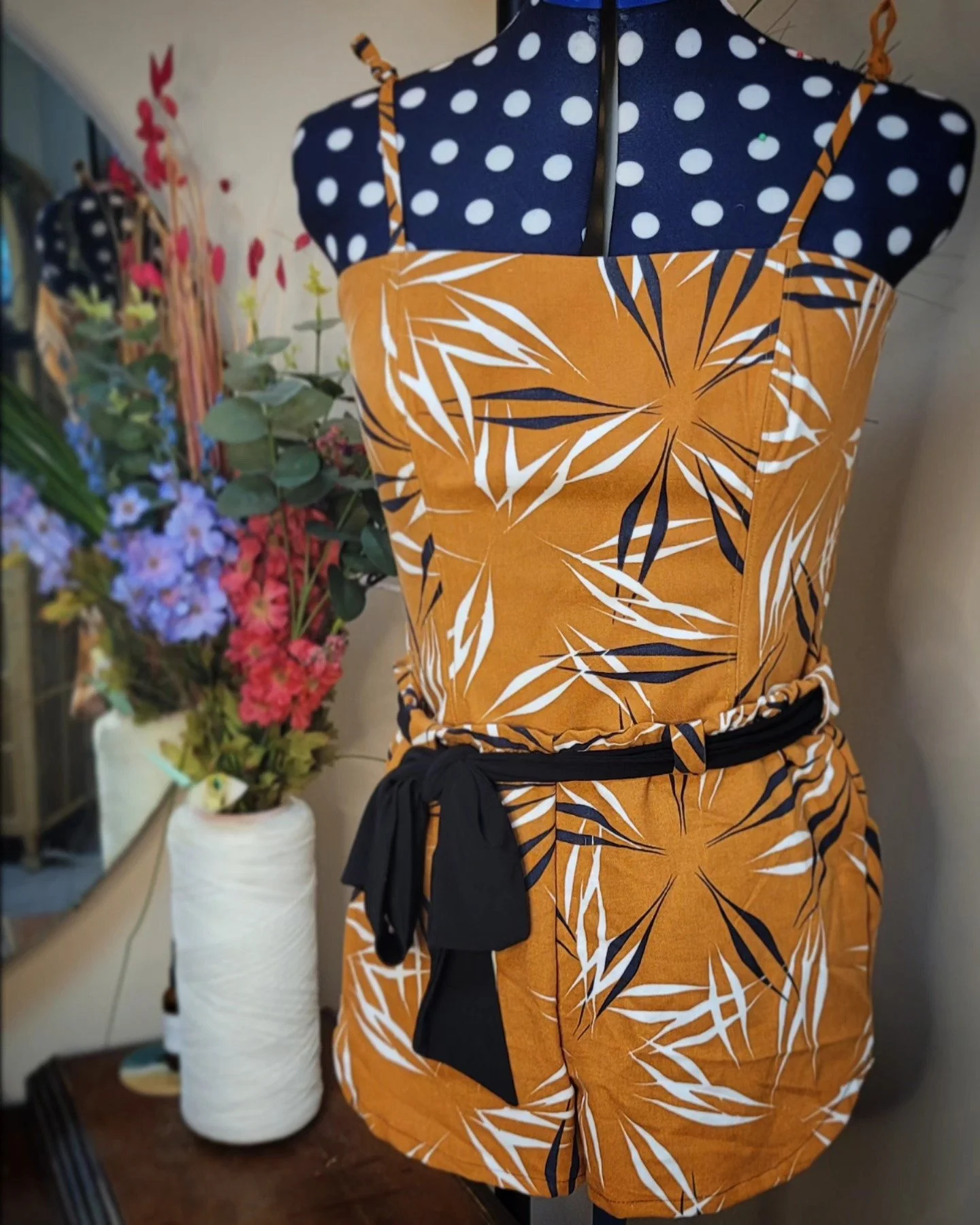 "Ligne" Linen 2-piece ensemble. The top corset is designed with comfortable boning for structure &amp; shape (lined with satin), bottom shorts are loose-fit with loops to accent a fabric belt &amp; support. A fun outfit for warm summer days