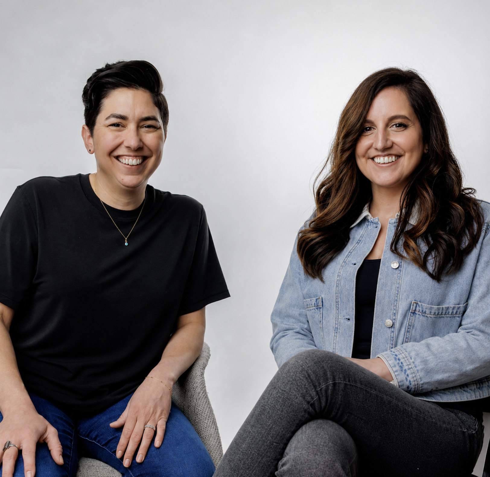 The co-founders of Lotus, Emily and Cristina sit smiling at the camera