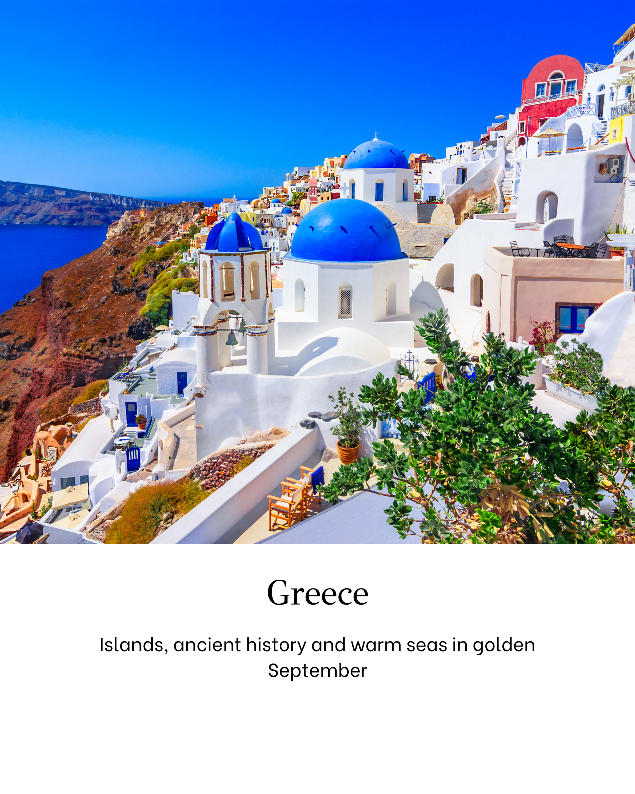Photo of Santorini, Greece, showing white buildings with blue domes, overlooking the deep blue sea under a clear blue sky.