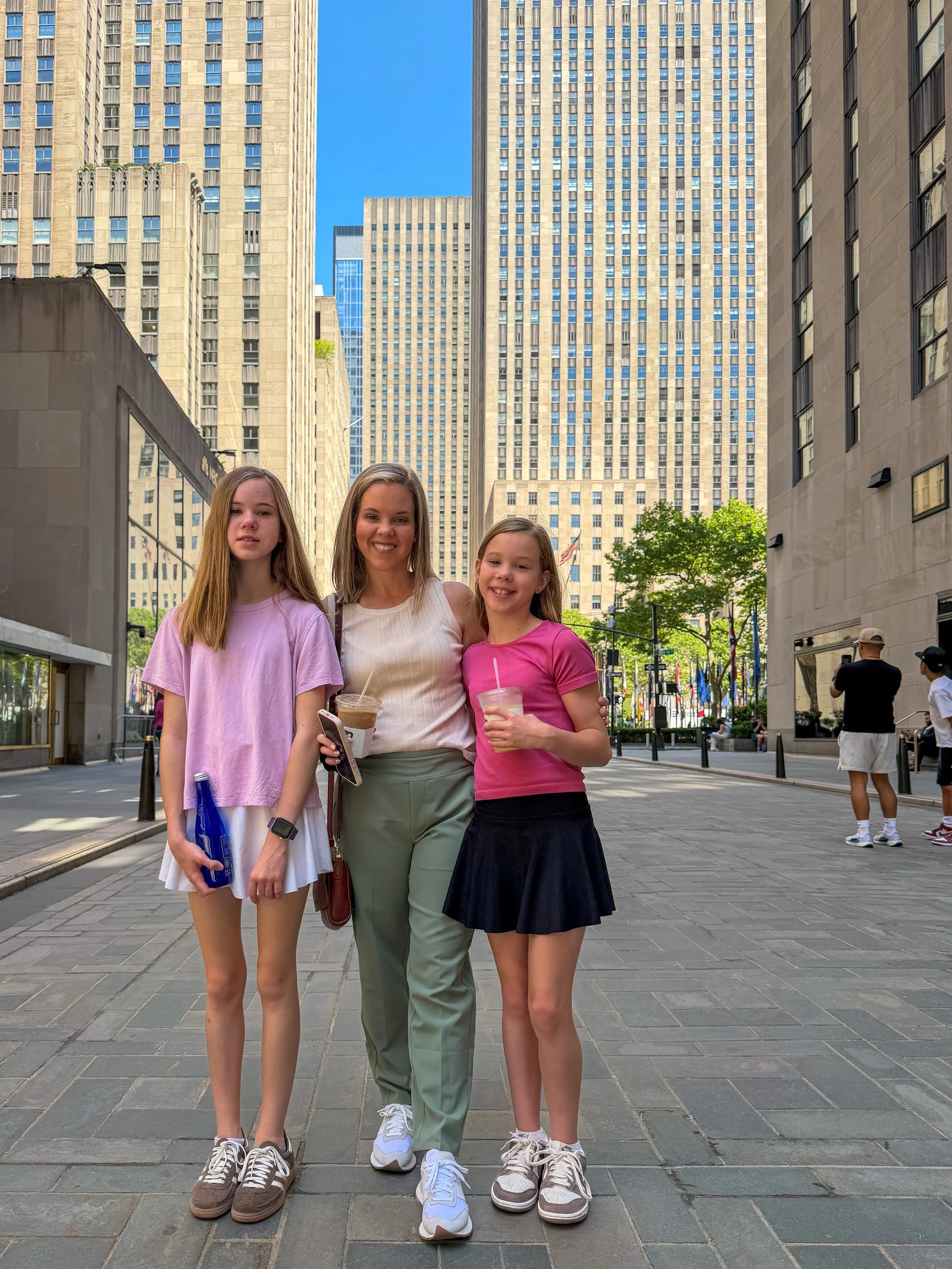 Mom and daughters in NYC near Rockefeller Center