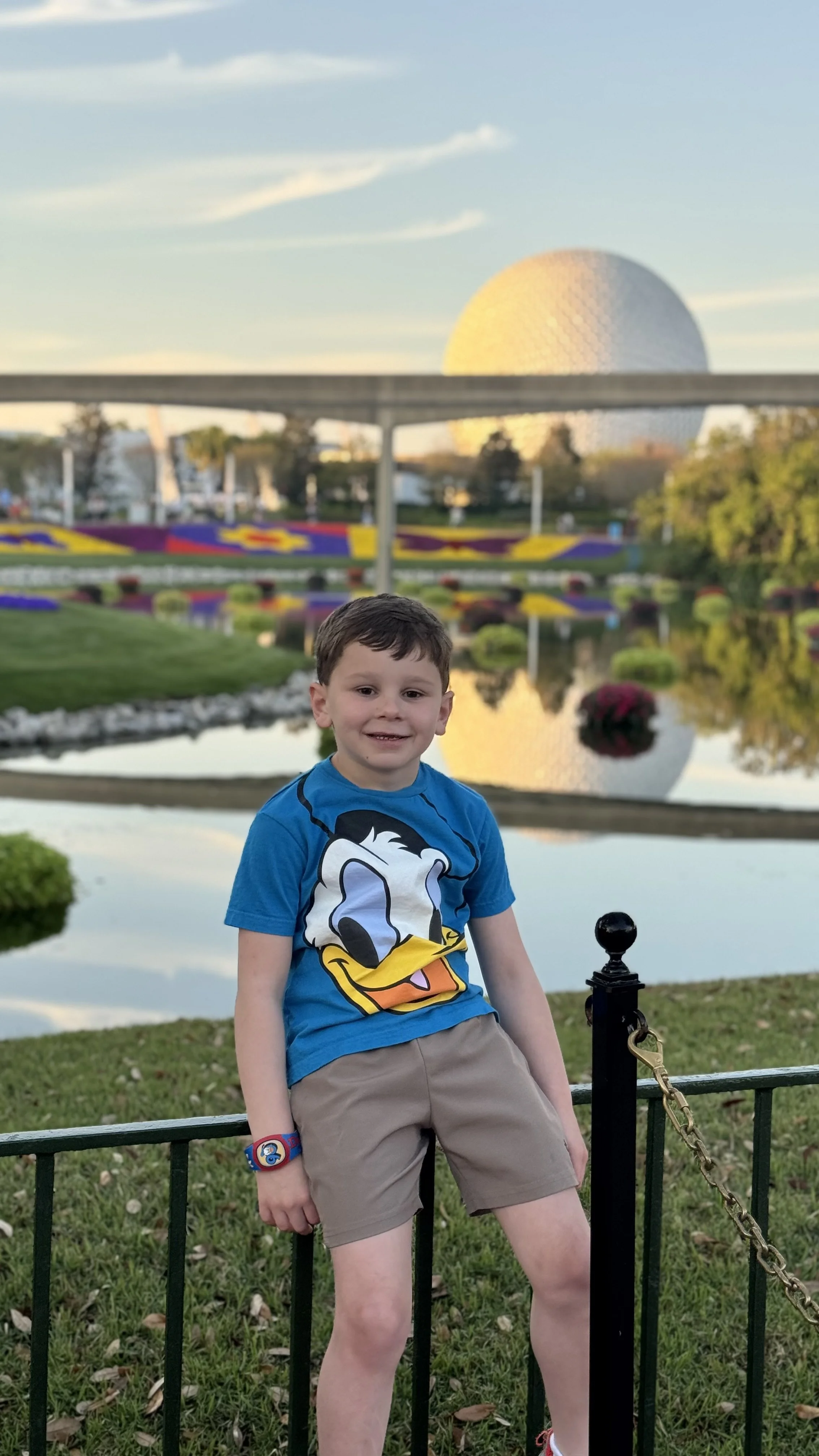 Jed at Epcot! one of our favorite backdrops is the Epcot ball!