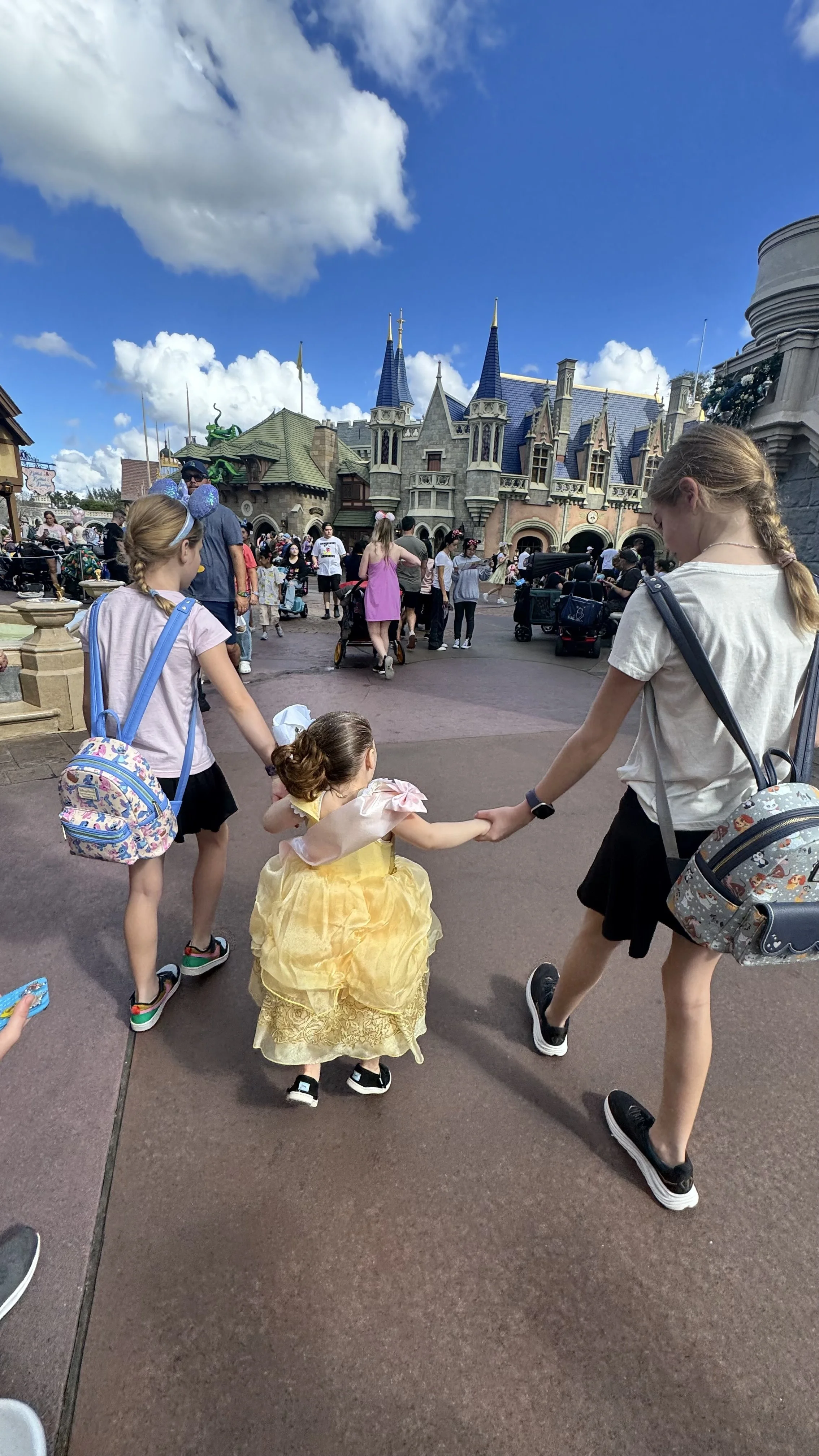 Joy and Rae with our niece who just finished her Bibbidi Boppidi Boutique experience at Magic Kingdom