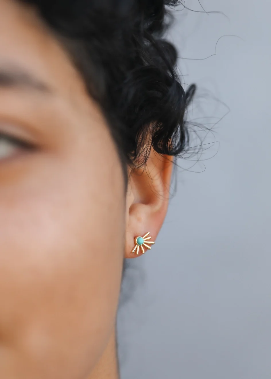 turquois sunburst earing.webp