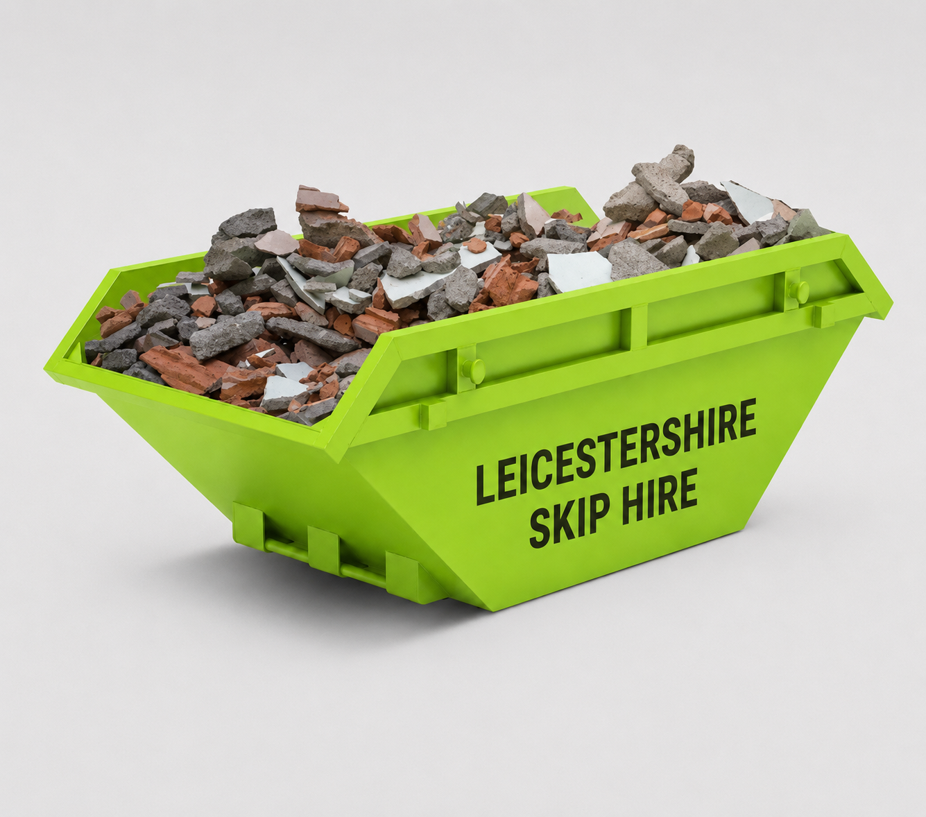 Green skip labeled Leicestershire Skip Hire filled with assorted construction debris.